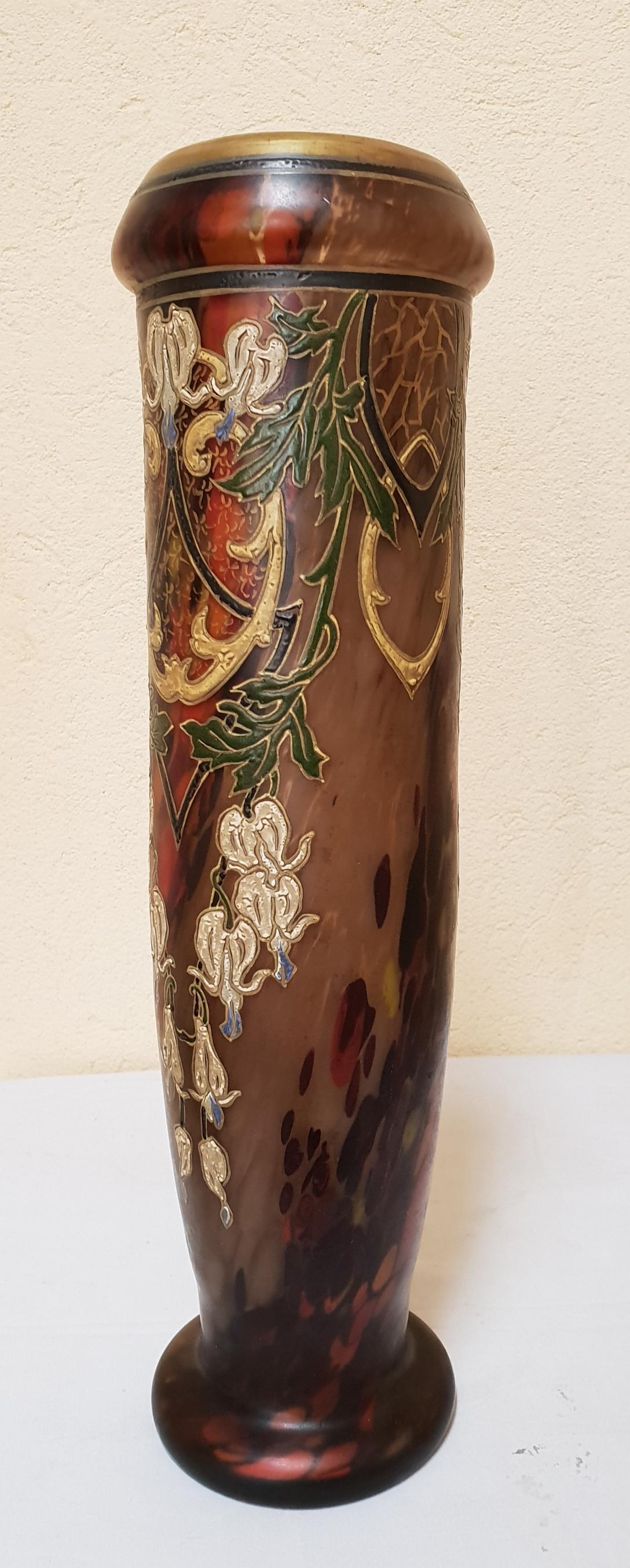 Glass Arabian Vase marbled background with a multitude of colors fused together in an arabesque motif.
Signed.

Legras was the first French artist  used this type of Arabic decoration in his production, which it was later resumed,  due to the great