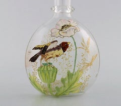 Legras, France. Carafe with Hand Painted Enamel Decoration in Art Glass
