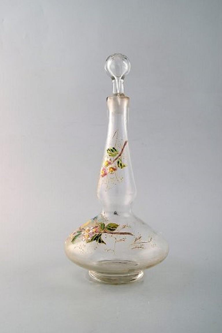 Legras, France. Carafe with hand painted enamel decoration
in mouth blown art glass. Birds and flowers, 1890s.
In very good condition.
Measures: 27 x 13 cm.
Literature: Marie-Françoise Jean-François Michel, Dominique and Jean Vitrat: