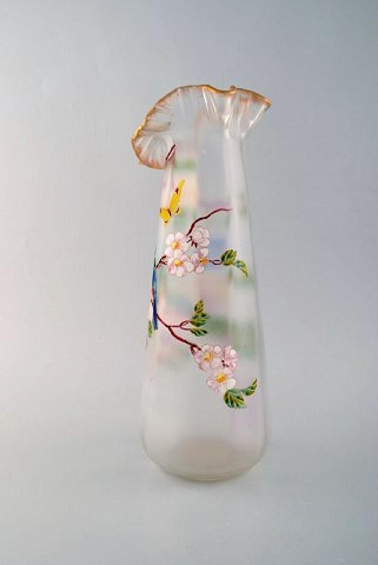 Legras, France. Large vase with hand painted enamel decoration in mouth blown art glass. Birds, flowers and butterflies, 1890s.
In very good condition.
Measures: 32 x 12 cm.
Literature: Marie-Françoise Jean-François Michel, Dominique and Jean