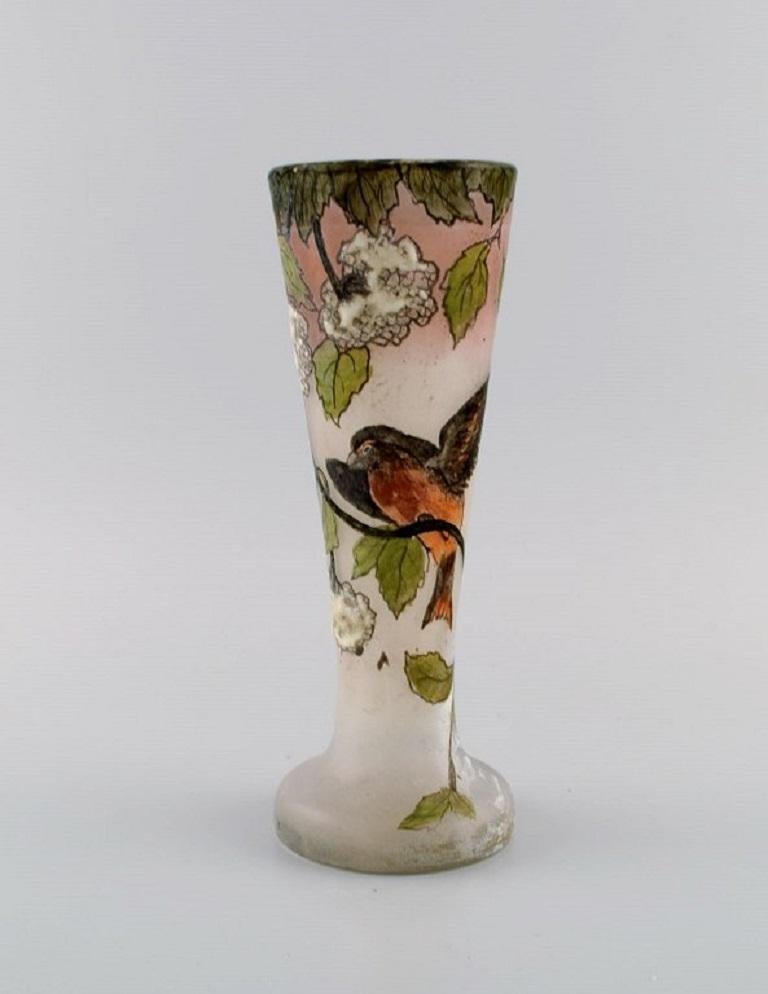 Legras, France. Unique vase in mouth-blown art glass with hand-painted foliage and bird motif. 
Early 20th century.
Measures: 24 x 9 cm.
In very good condition. Peeling in the paint.
Signed.