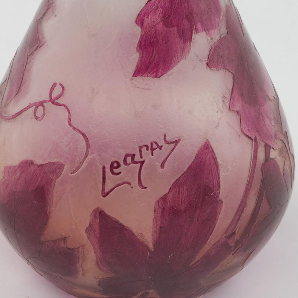 Legras Rubis Series Cameo Vase, c1910

Additional information:
Date : c1910
Origin : St. Denis, Paris
Bowl Features : Polished magenta high relief ivy leaves on a clear and faintly peach ground. Acid cut back
Marks : Legras
Type : Lead
Size : H 23.2