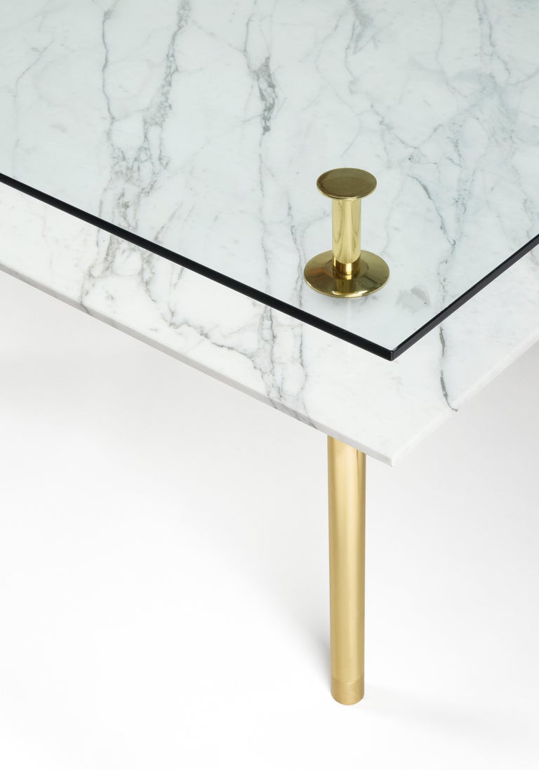 Table in crystal and brass. The designer imagines a turning point in the use of such a precious finishes such as polished brass: from the idea of almost a unique object in its perfect craftsmanship, to the system to be built starting from the base.