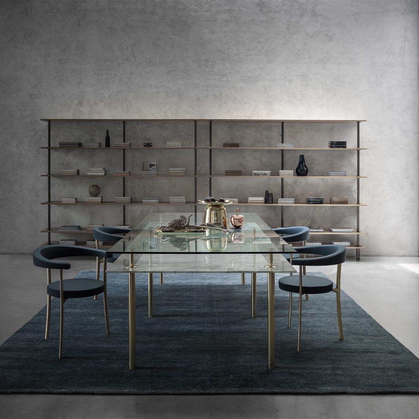 This exquisite dining table will make an elegant statement in a contemporary or classic dining room, thanks to its timeless design, inspired by the harmonious proportions of classical architecture, and the precious materials used to craft it. Six
