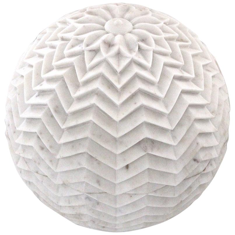 Inspired by the leheriya (similar to chevron) pattern she observed in her travels in rural Rajasthan, Stephanie Odegard designed this beautiful floor/outdoor lighting fixture. Solid pieces of marble are first turned into hemispherical halves and