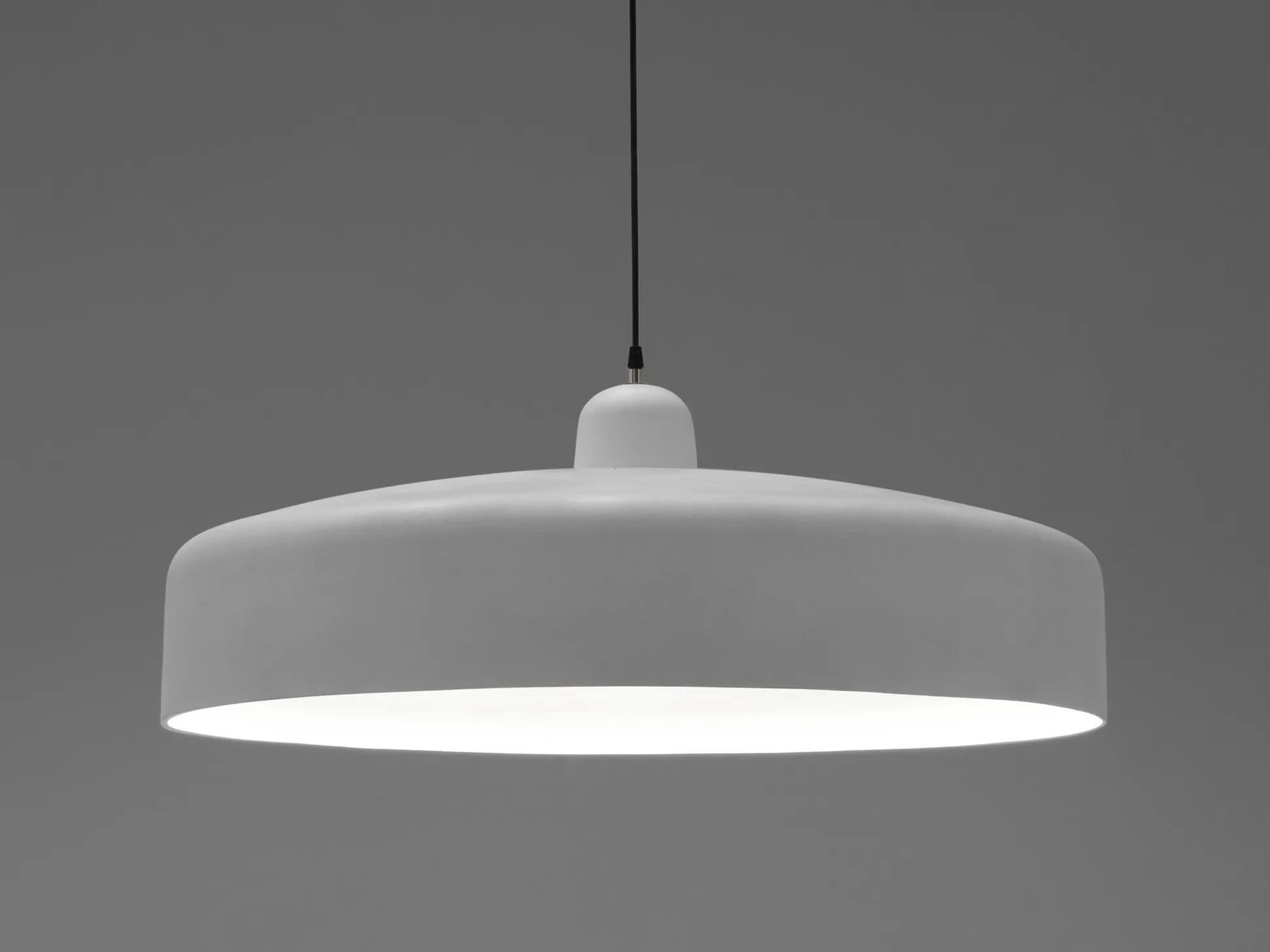 Lei pendant lamp by Imperfettolab
2017
Designer : Verter Turroni
Dimensions: Ø 85 X 35 cm
Materials: Fibreglass

The apparent simplicity of this lamp conceals a careful study of lines and proportions. Its presence, suspended in the space of a