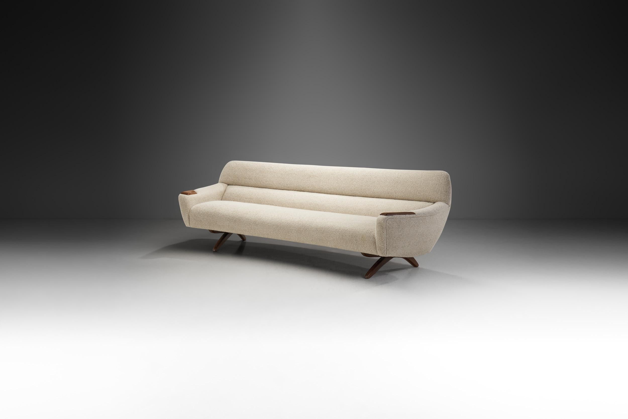 Leif Hansen’s Model 62 sofa is commonly referred to as the “Geisha” and was designed in 1959. This model is a strikingly elegant example of Danish modernism’s streamlined, luxurious aesthetic appeal to contemporary eyes.

This three-seater sofa is