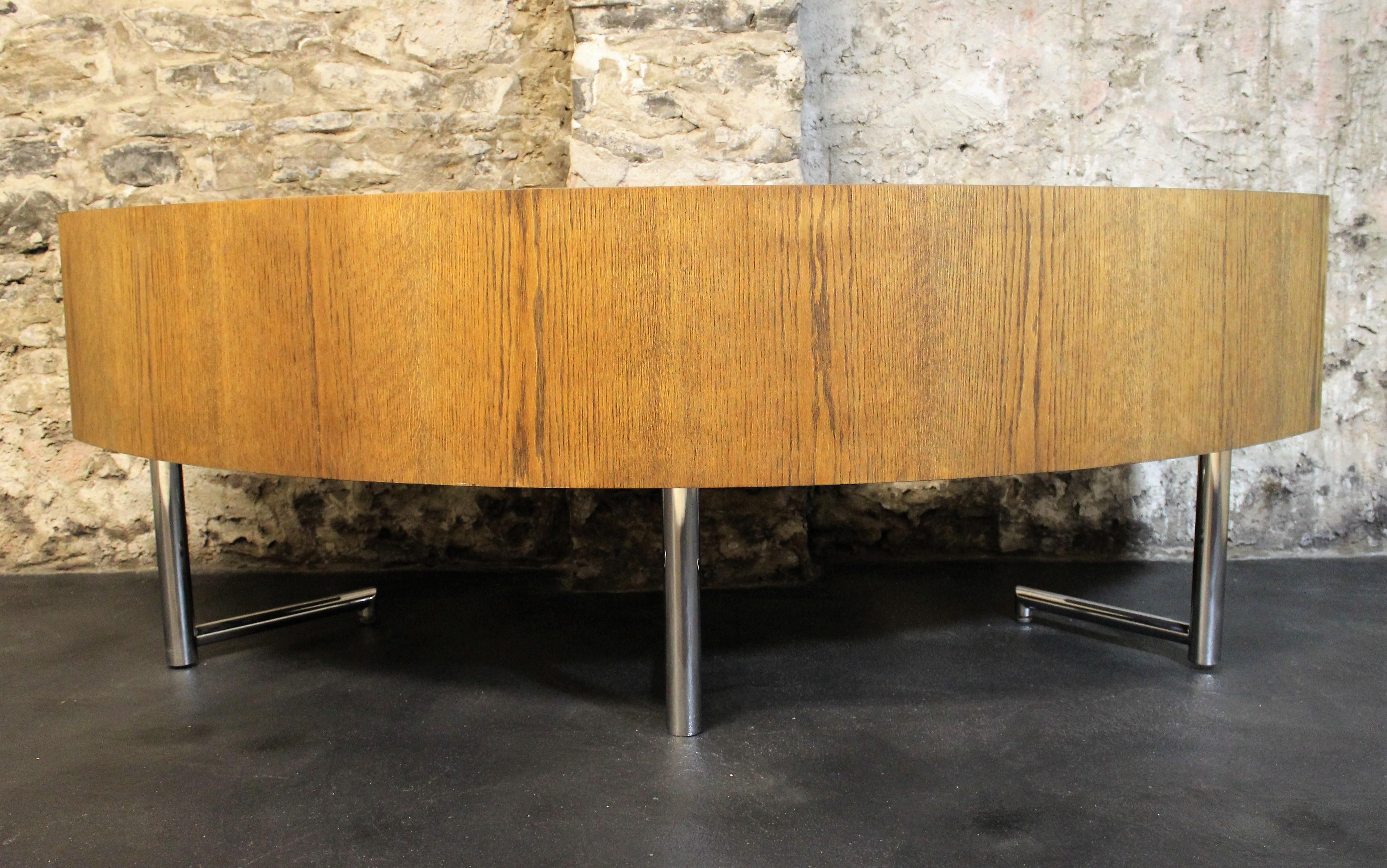 Mid-Century Modern curved oak desk by Leif Jacobsen. Features cantilevered legs with leather sliding drawers and metal stringing inlay. The interior has metal rods for file folders built in.