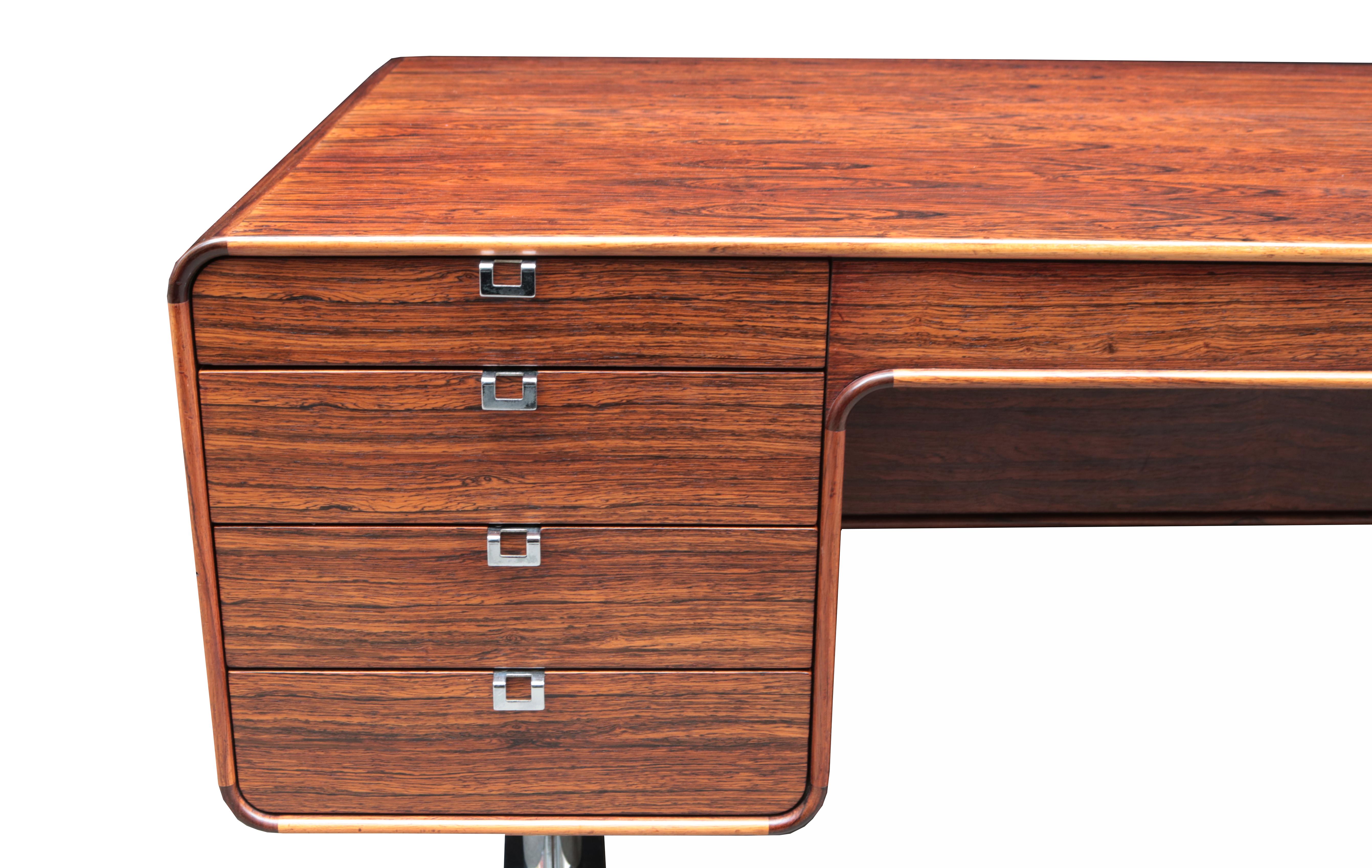 A Leif Jacobsen designed executive desk.
Rosewood with chromed metal legs and pulls.