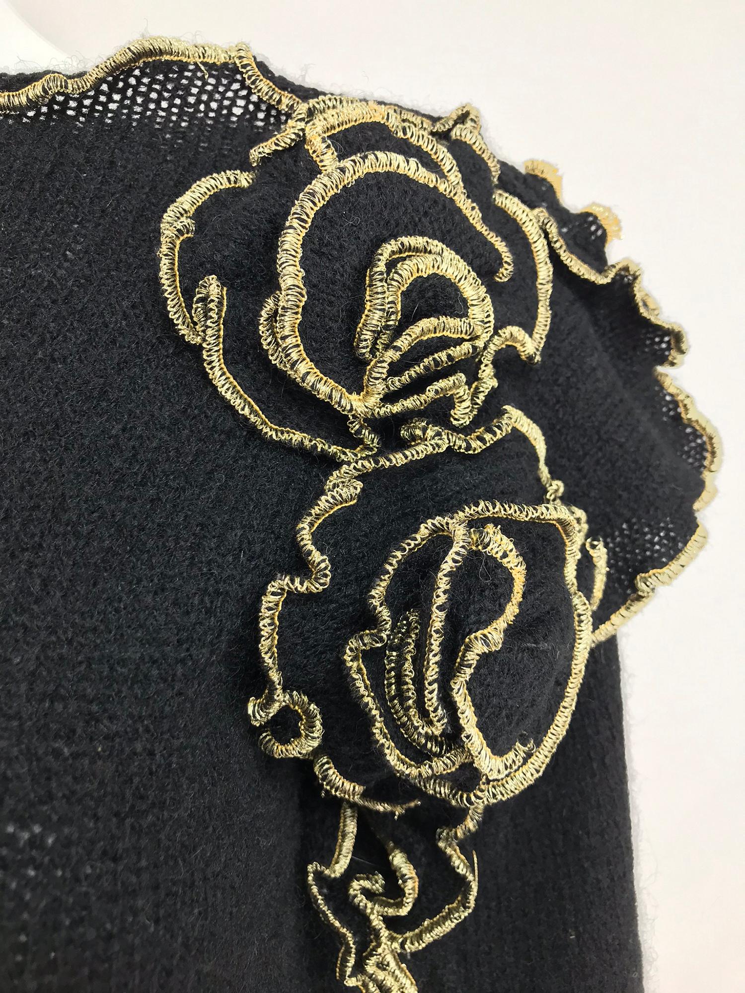 Leigh Westbrook Black Knit Gold Trim Floral Applique Sweater from the 1980s. Leigh Westbrook was located in New York City in the early 1980s and specialized in knits, sweaters, coats and capes with signature coloured serged edgings, and three