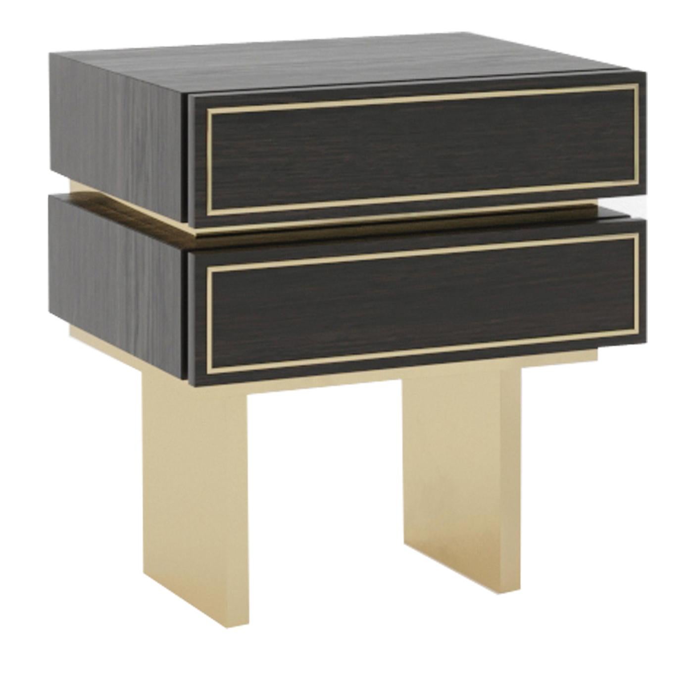 A rigorous and refined geometrical design characterizes this polished nightstand. Complemented by two thin brass-finished metal sheets functioning as legs, the upper structure of this piece has a dark brown wood finish and consists of two drawers