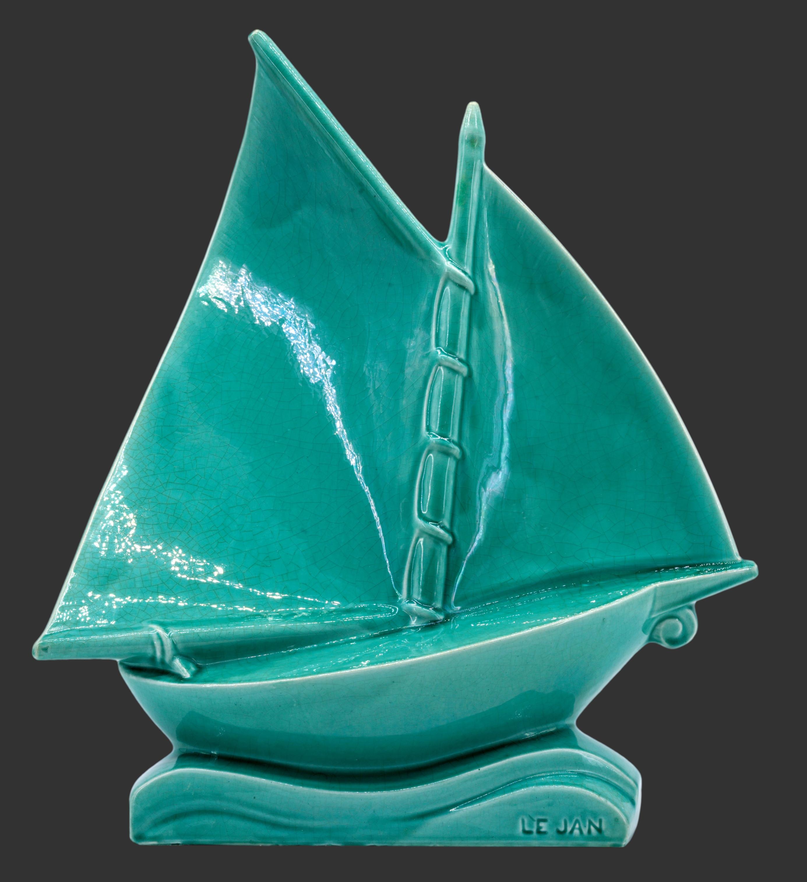 Crackle glaze ceramic ship sculpture by LEJAN at Orchies, France, circa1920s. Wonderful green color. Width: 16.5