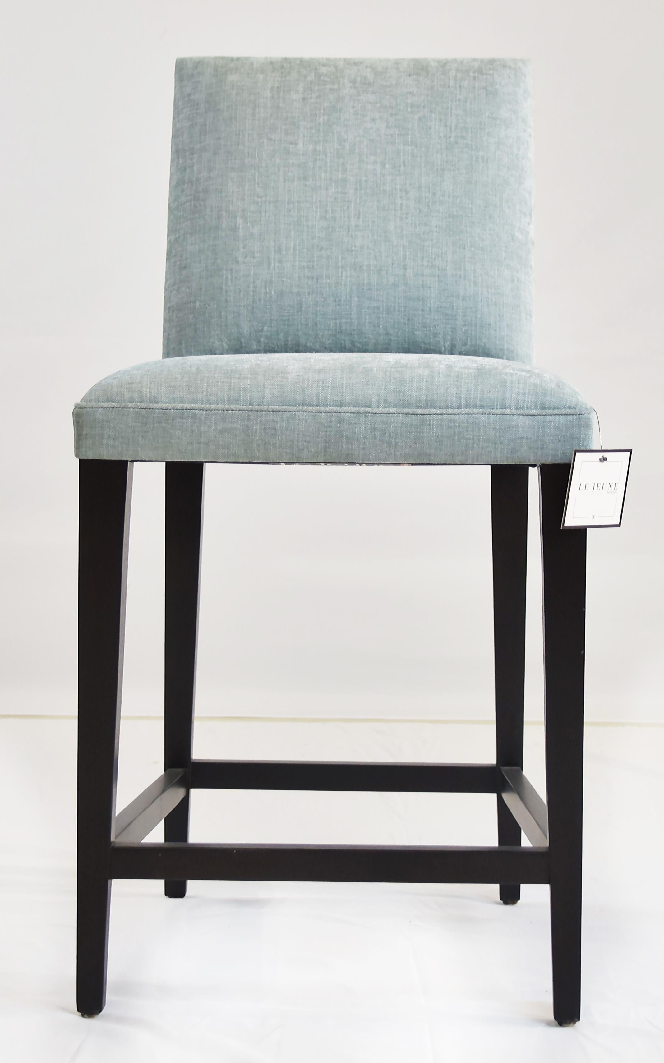    

Le Jeune Upholstery Cutler Counter Stool Floor Model with Wood Footrest

Offered for sale is a counter-height Cutler bar stool showroom floor sample from Le Jeune Upholstery. The stool has a tight seat and back with exposed Mahogany wood legs