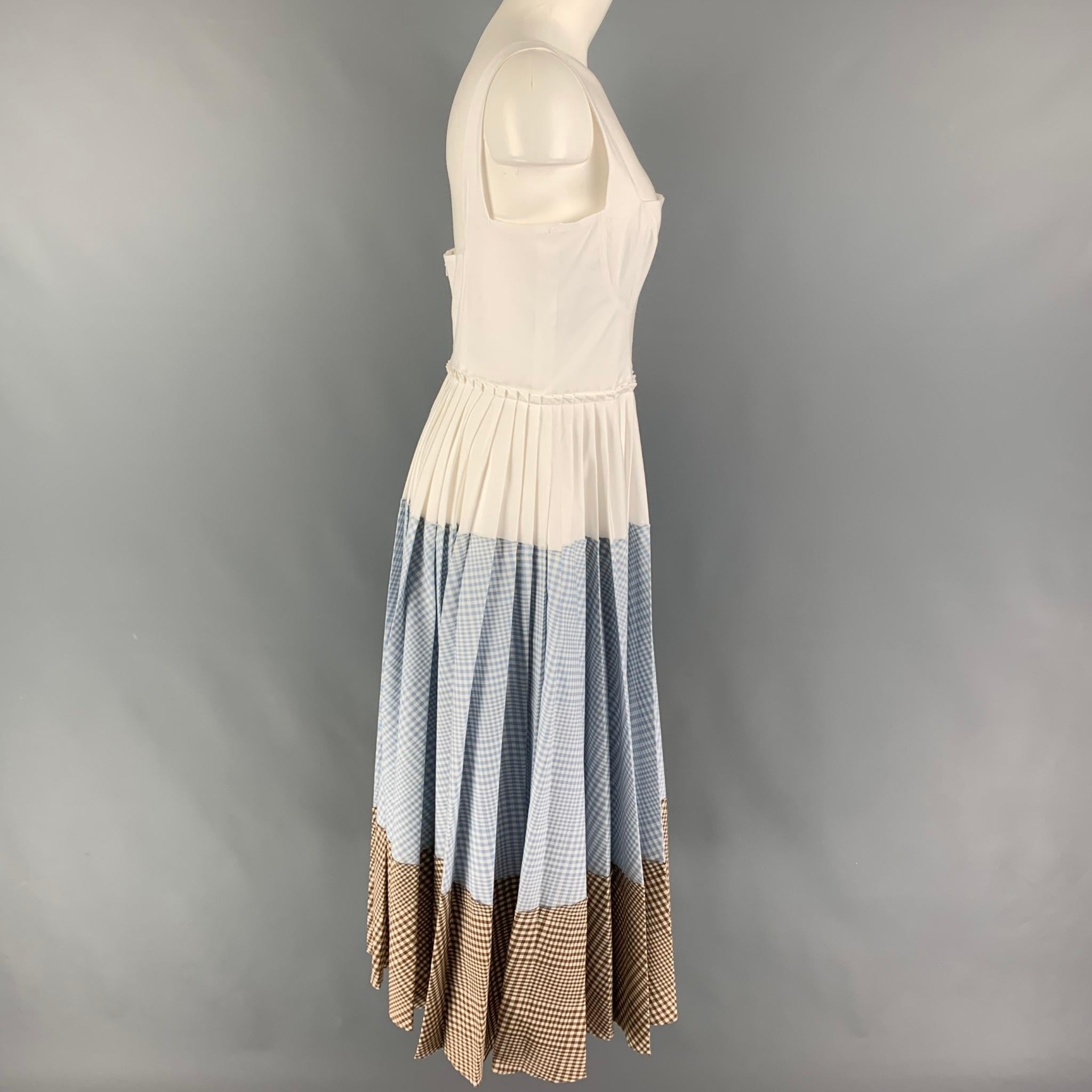 LELA ROSE 2019 dress comes in a white cotton with a blue & brown gingham print design featuring a pleated style, sleeveless, and a back zip up closure. Made in USA. 

Very Good Pre-Owned Condition.
Marked: 8
Original Retail Price: