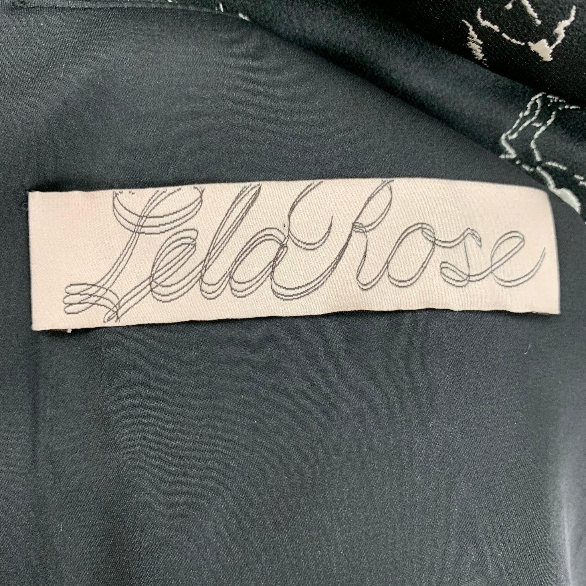 LELA ROSE Größe S Schwarz-Weiß-Satin-Bluse mit Blumenmuster und Schößchen Damen im Angebot