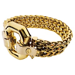 L’eleganza intrecciata dell’oro 18 kt bicolore