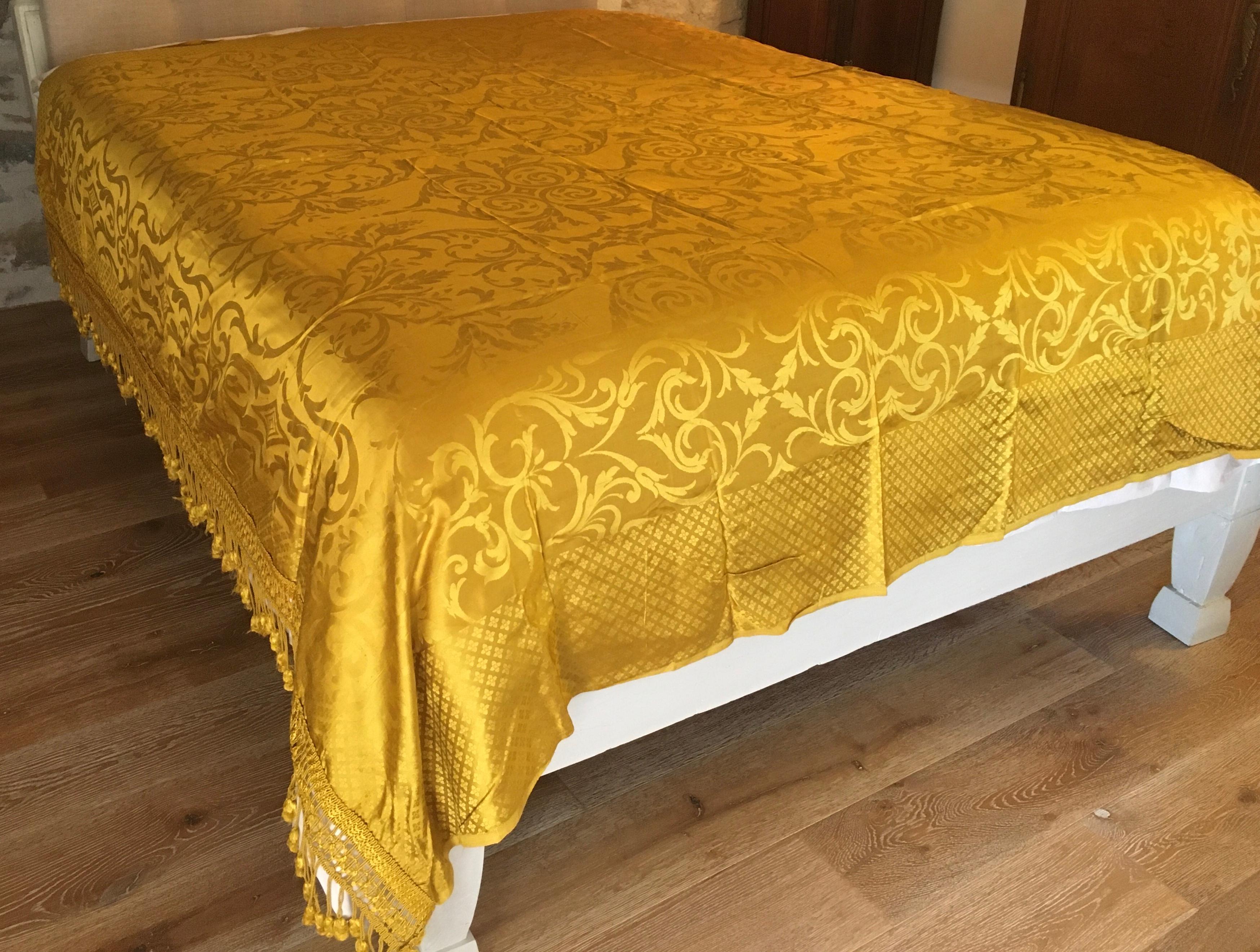 Beautiful bed throw or bedspread from Lelievre. 
Antique trims embellish the borders of the bed cover. 

Fits a queen bed.
Measures: 88” wide x 77” long

This fabric would also look great when used to make pillows. 