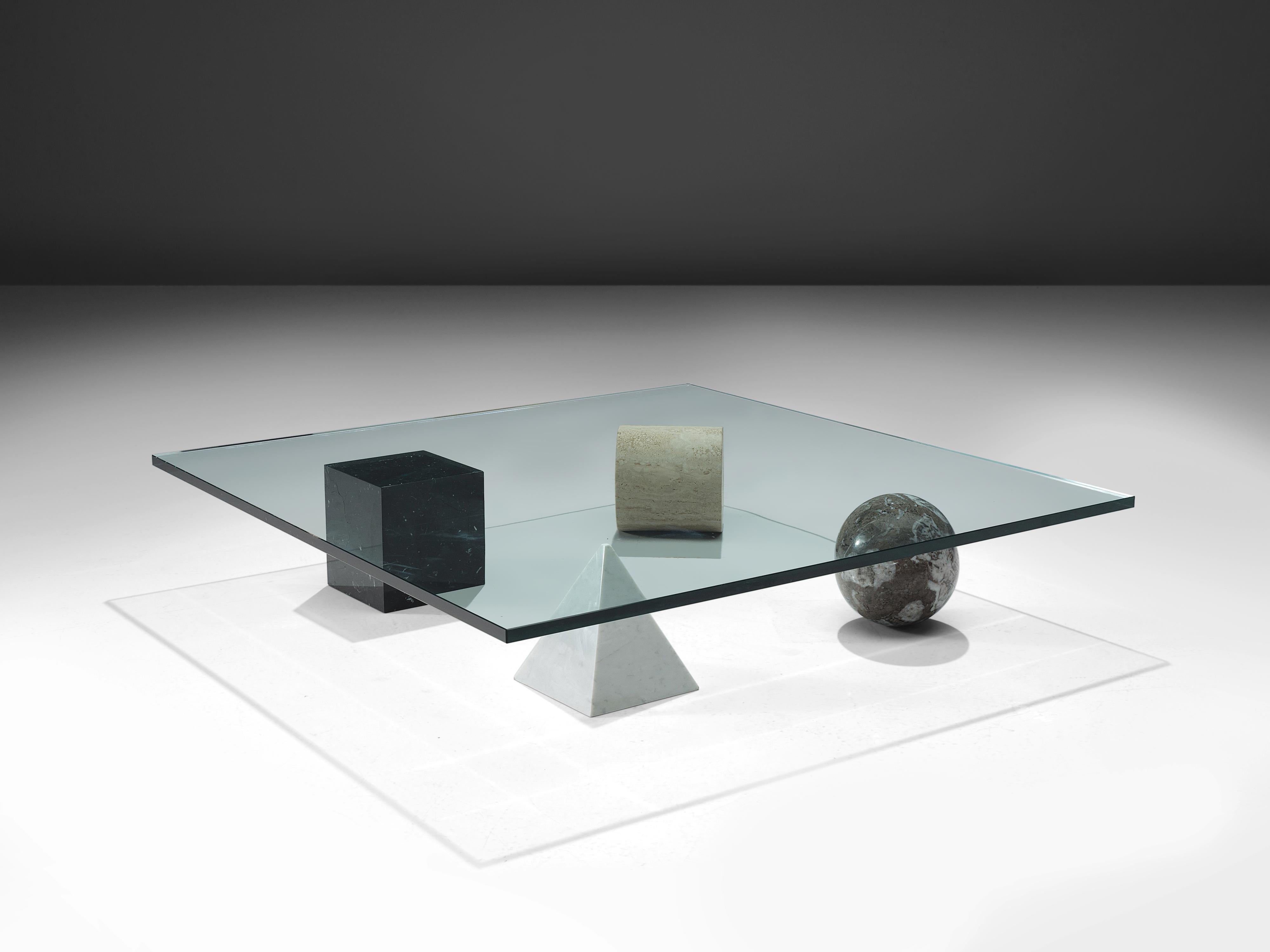 Lella and Massimo Vignelli, coffee table ‘Metaphora’, marble, stone, glass, Italy, 1979

Stunning coffee table by Italian designers Lella and Massimo Vignelli. Four geometric elements lift up the square tabletop. The glass top allows the view to the