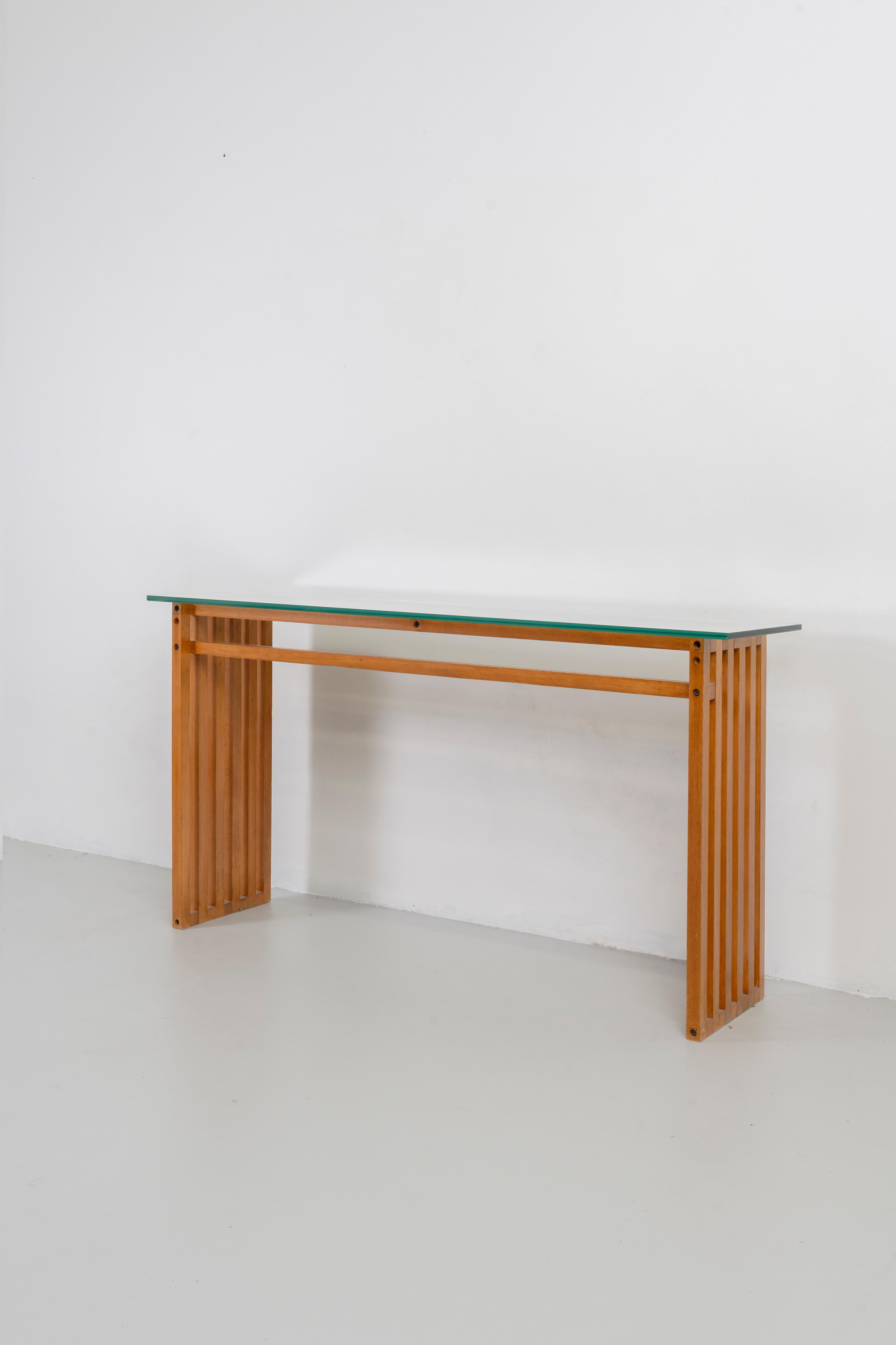 Ara console table with a wooden structure and a glass top, was designed by Lella and Massimo Vignelli and manufactured by Driade in 1974.

Licterature: G. Gramigna, Repertorio del Design Italiano 1950-2000, p. 225, Allemandi, 2003.

On January 10,