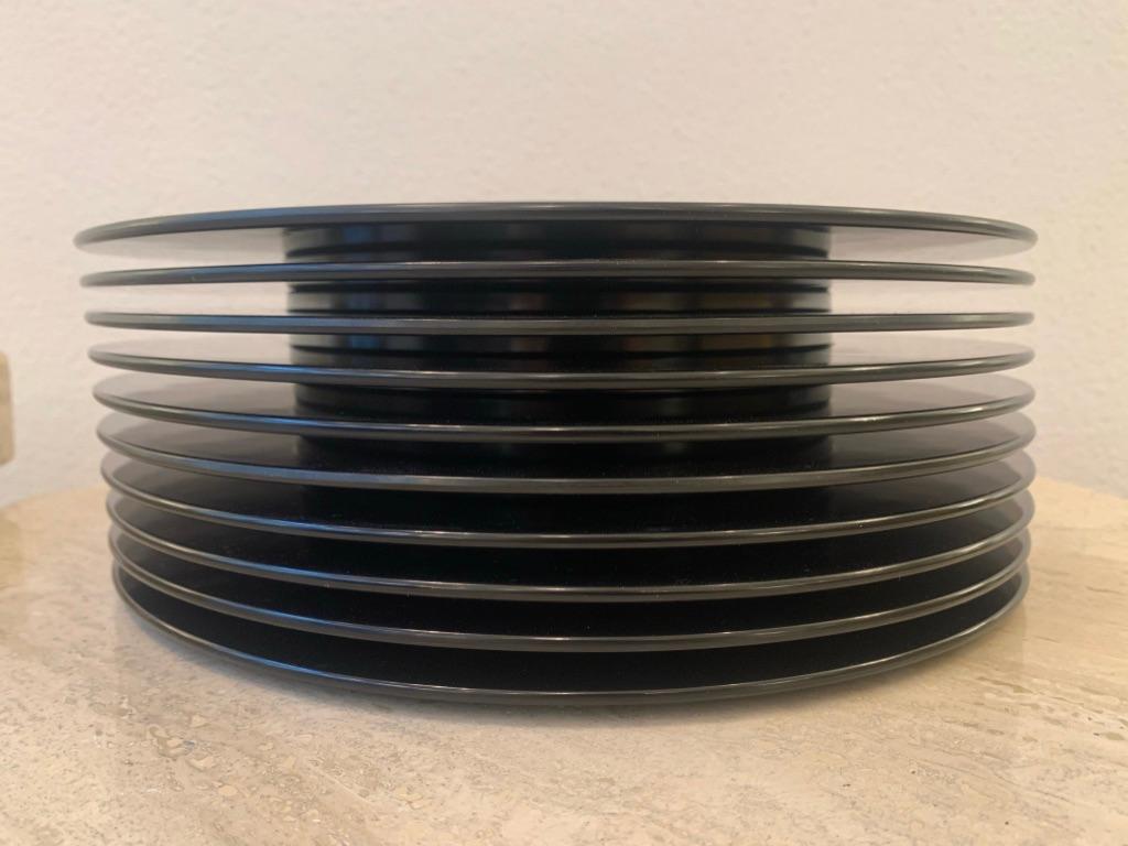 Set of 10 stackable dinner plates in black melamine by Lella & Massimo Vignelli produced by Casigliani, Italy 1979
2 or 3 plates got small signs of use ( pictures )
Measures: D 31 x H 1.5 cm
Signed and dated.