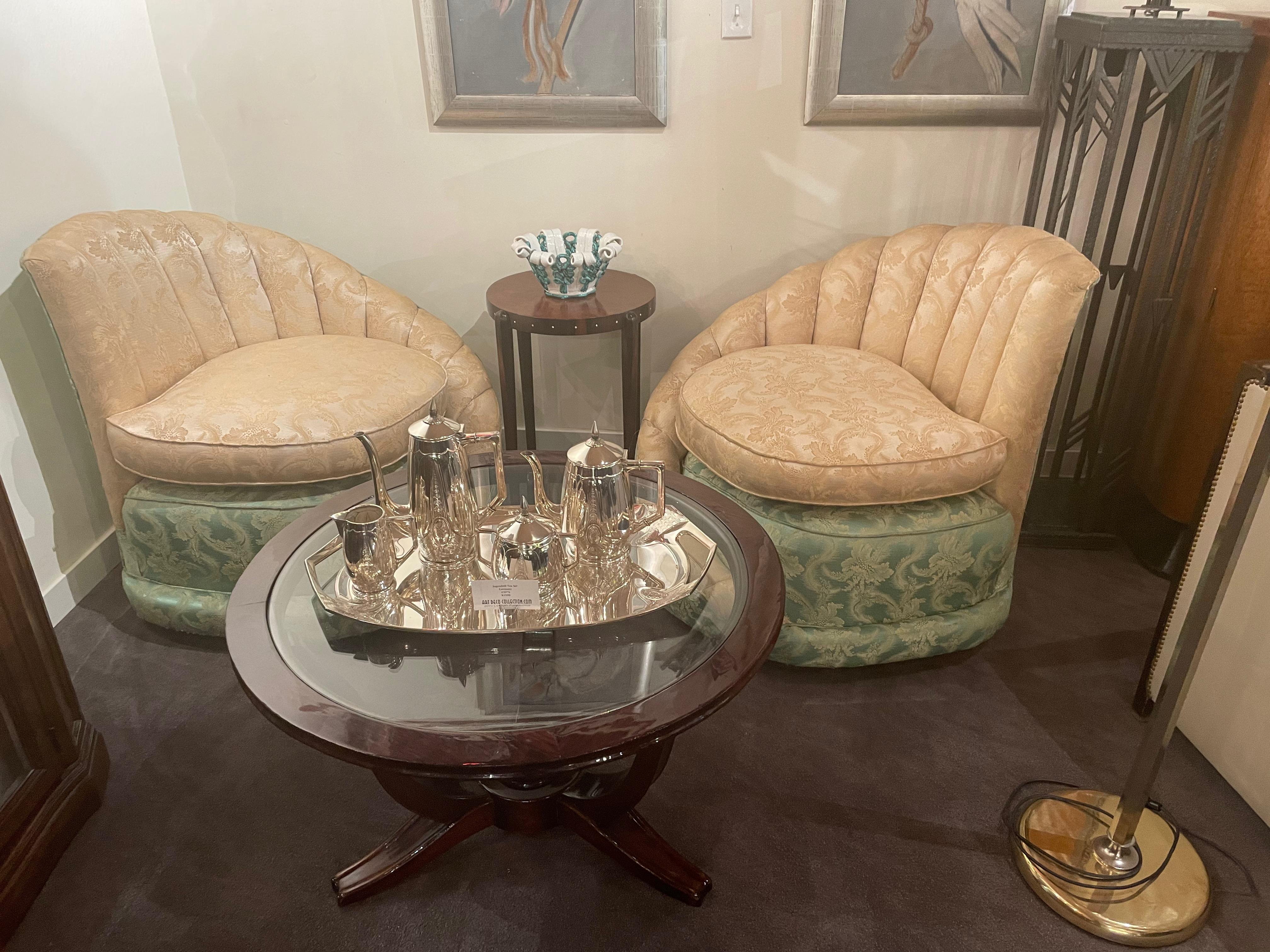 Art Deco French round wood coffee table with glass top. Classic French in the style of Lelu with tripod style elegant legs, strong and supportive with chiseled top horizontal edge design and glass insert. Recent restoration and just added to our