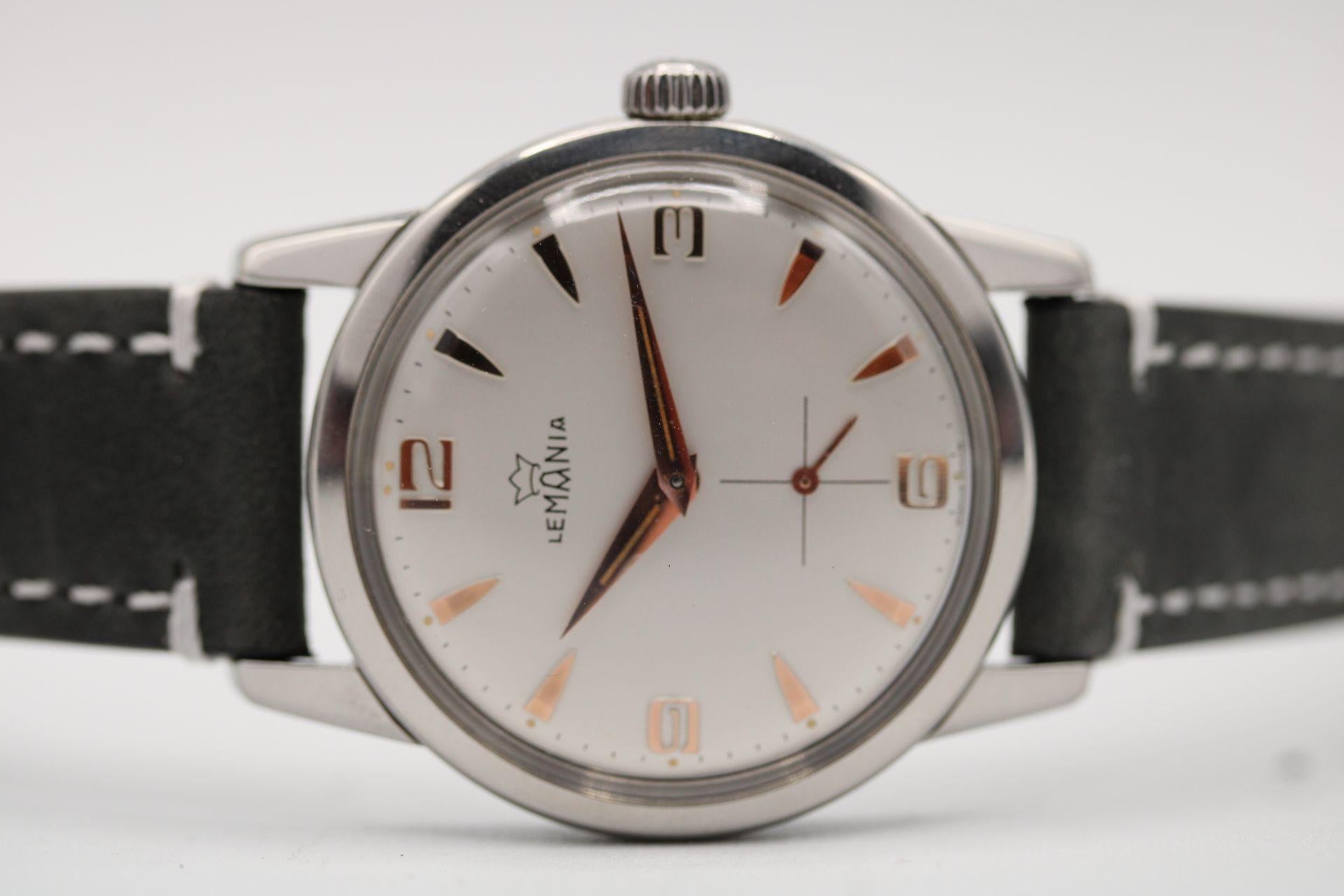 A wonderful example of an iconic early Civilian Lemania thought to be from the mid 1950's and in exceptional original condition for a watch of that age. 

35mm case diameter  that is 7mm that does not include the domed armed plexiglass. 18mm lug