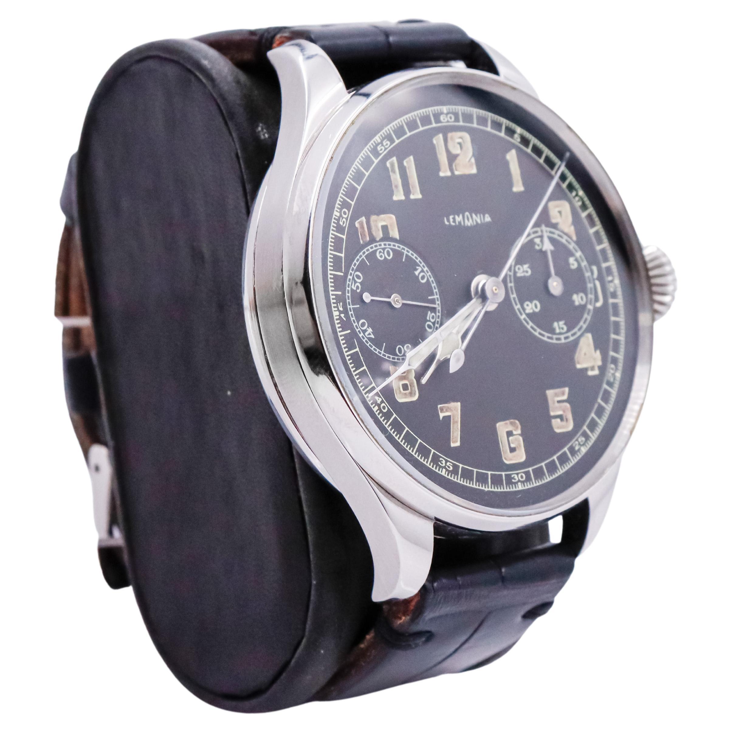 FACTORY / HOUSE: Lemania Watch Company
STYLE / REFERENCE: Oversized Chronograph with Exhibition Back 
METAL / MATERIAL: Stainless Steel
CIRCA / YEAR: 1910's
DIMENSIONS / SIZE: Length 56mm X Diameter 46mm 
MOVEMENT / CALIBER: Manual Winding / 17