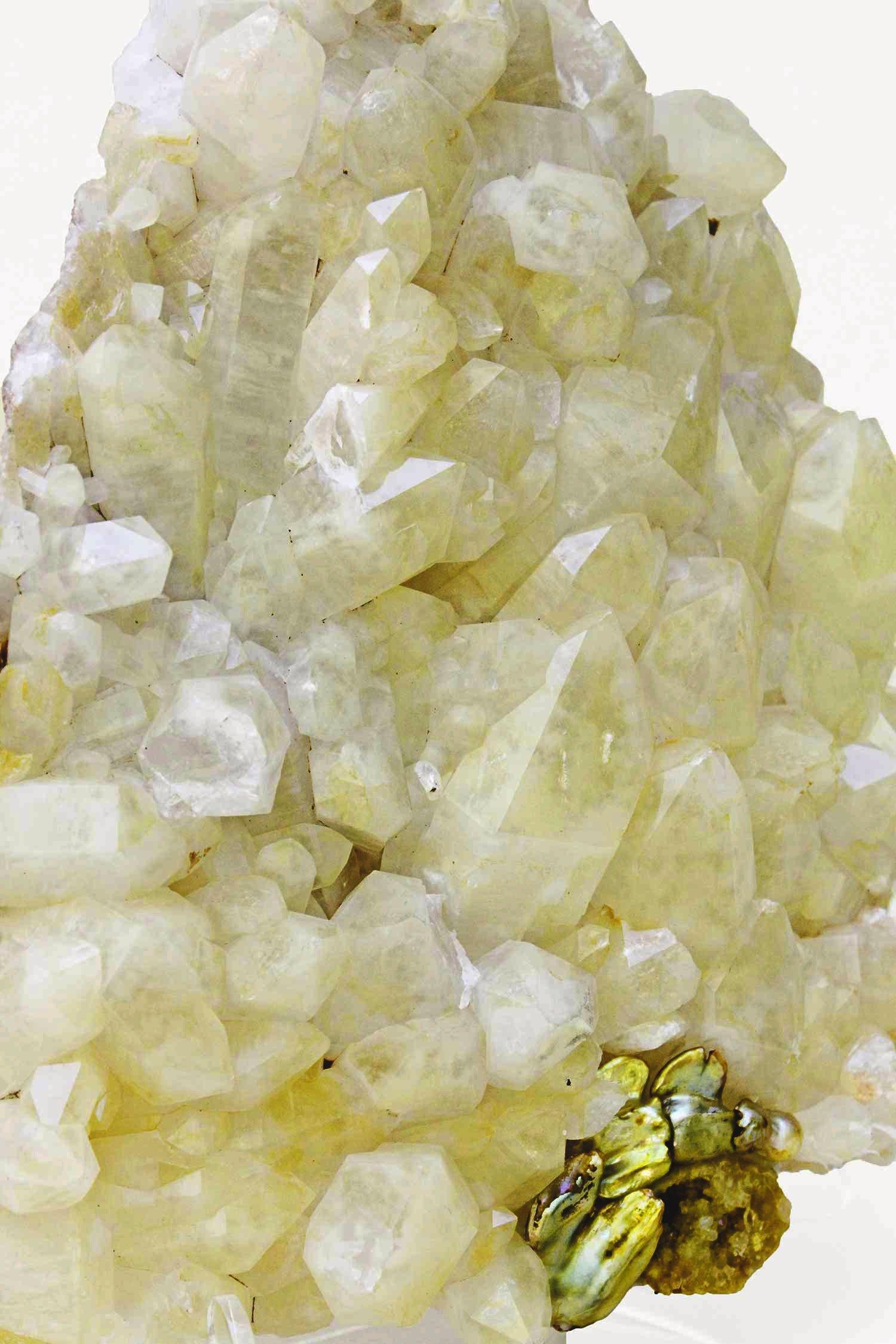 Lemon quartz crystal cluster with coordinating natural forming Baroque pearls and geode on a Lucite stand. Lemon Quartz is known for its color that has naturally formed in its matrix. This is an unusually large specimen of the particular mineral.
