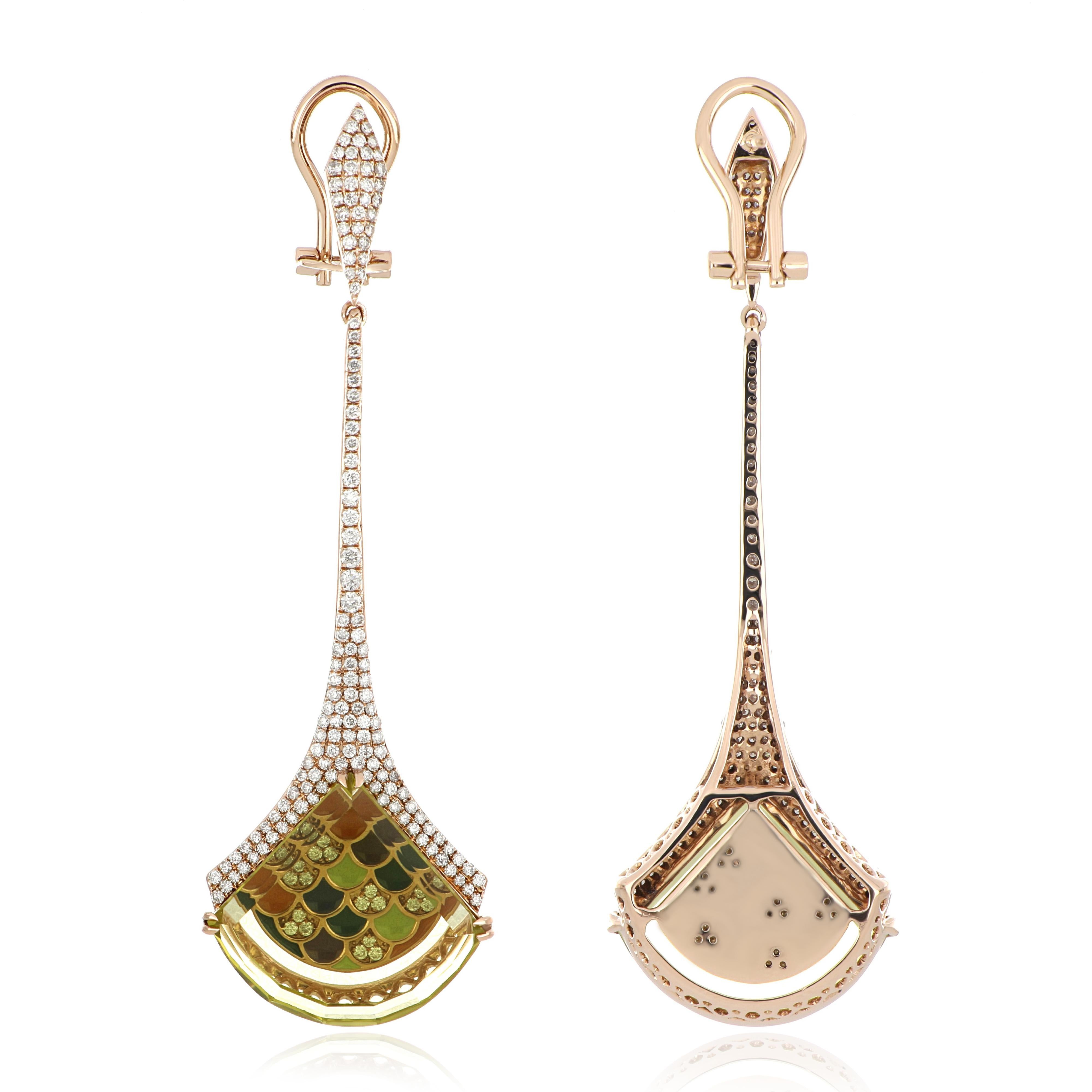 14 Karat Yellow Gold Earrings studded with Fancy Cut  20.10 Cts (total wt) Lemon Quartz,  with unique under stone setting of 1.48 Ct Diamond hand crafted in 14 Karat Yellow Gold.

Stone Details:
Lemon Quartz: 18.9 x 17.2 mm

Stone Weights:
Crystal
