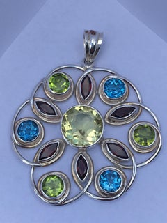 Lemon Quartz, Peridot, Blue Topaz and Garnet Pendant