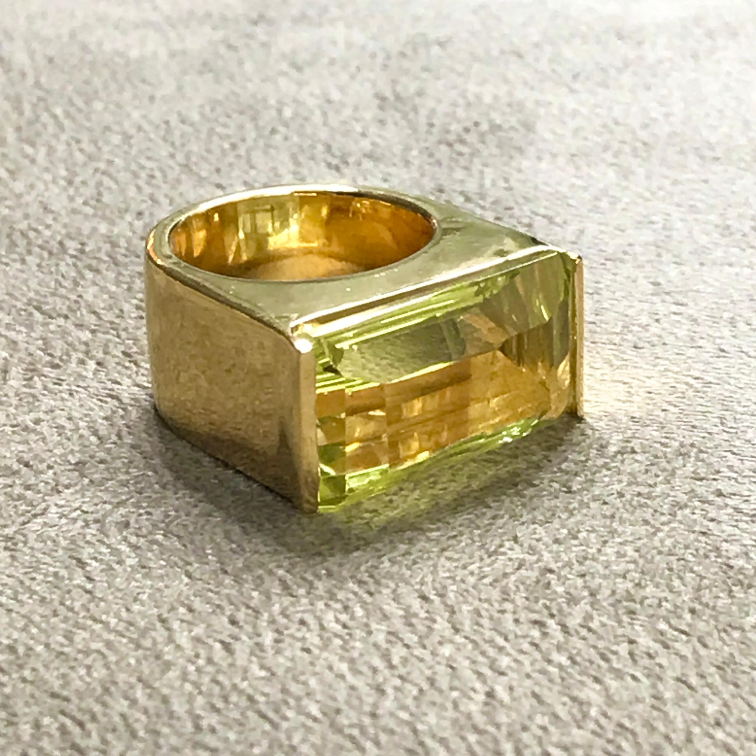 An extremely simple, yet stylish ring focusing on a beautifully cut Lemon Quartz baguette.

The stone, which has a lovely even & lustrous colour is mounted in a very simple setting designed to support and focus the stone.

Despite its' simplicity,