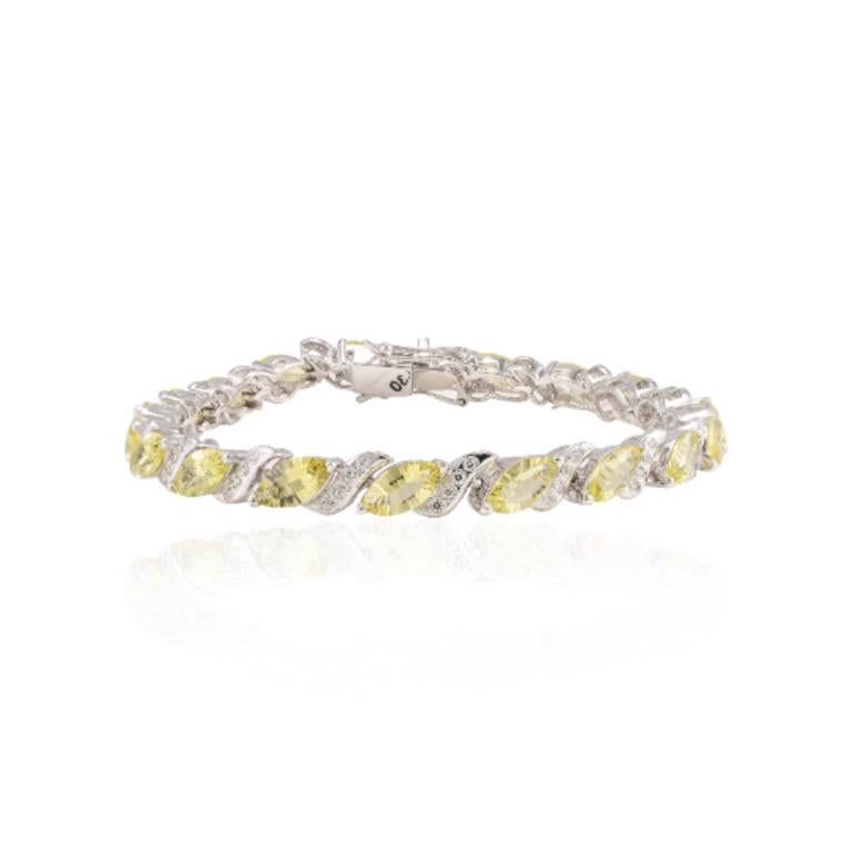 Beautifully handcrafted silver Lemon Topaz and Diamond Tennis Bracelet, designed with love, including handpicked luxury gemstones for each designer piece. Grab the spotlight with this exquisitely crafted piece. Inlaid with natural lemon topaz