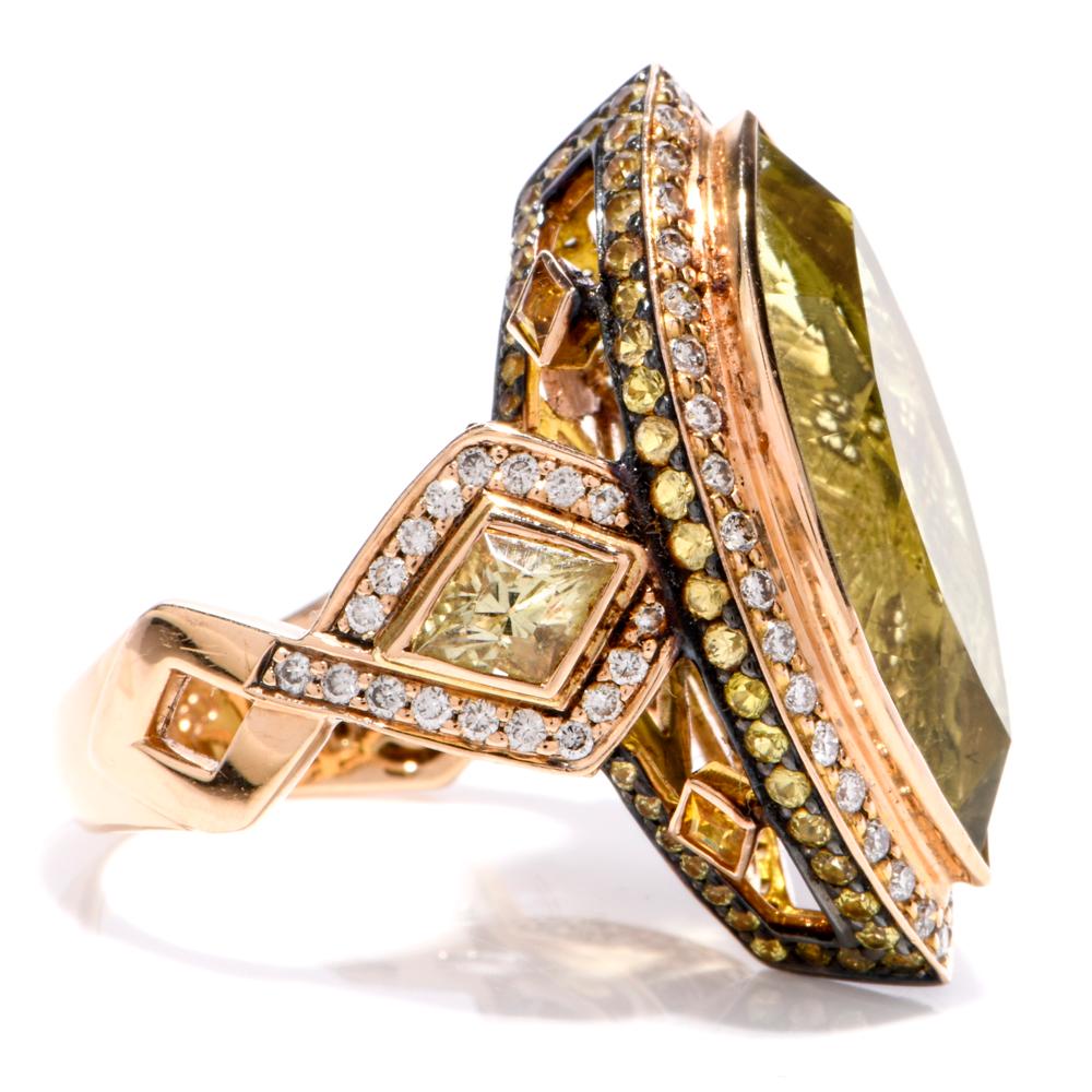 This cocktail ring of bold and colorful aesthetic is crafted in 14-karat rose gold, weighs 13.2 grams and measures 30 mm wide and 10 mm high. Inspired by the Medieval design of rings, the ring features a marquise shape plaque, centered with a