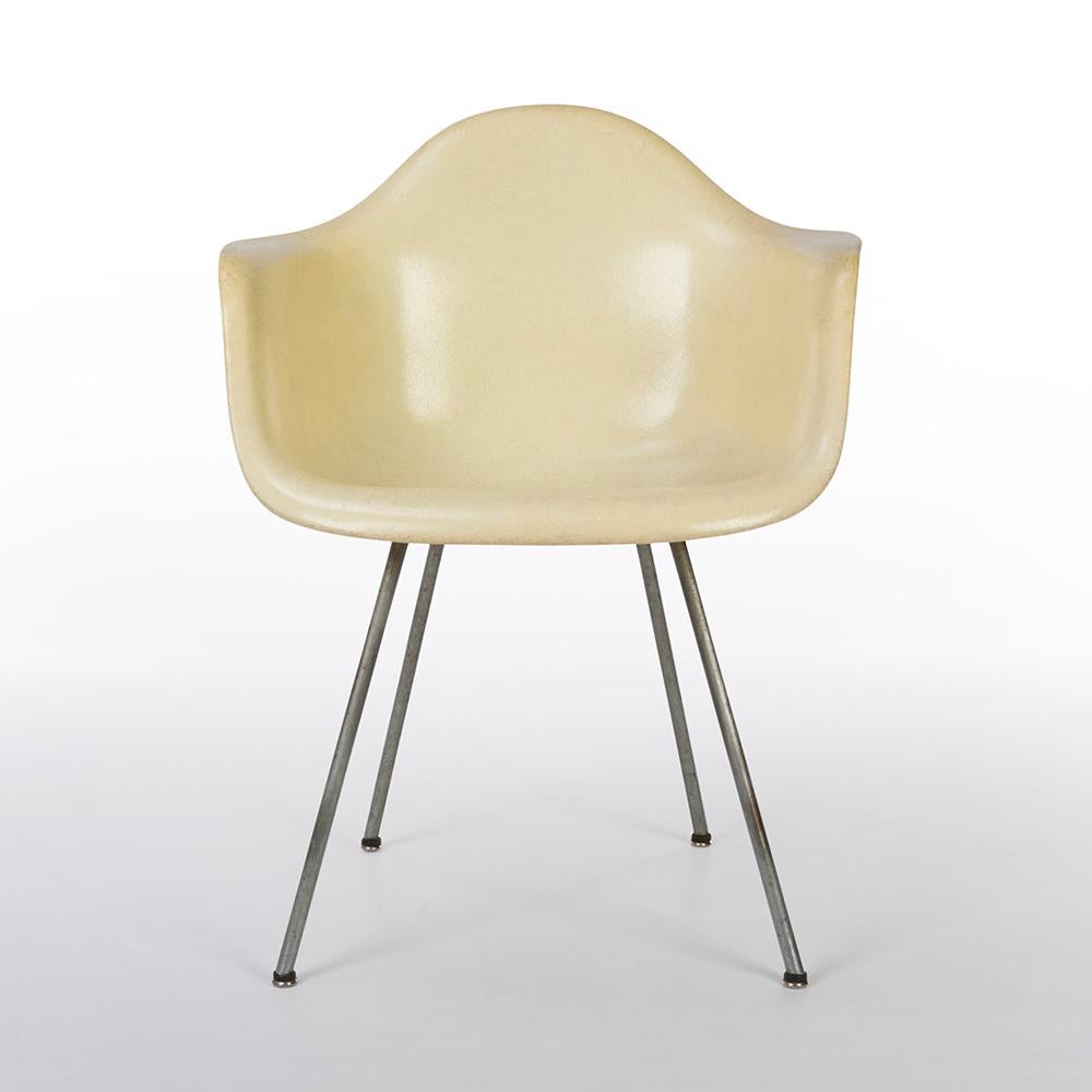A great example of an iconic, vintage, First Generation Zenith all original Eames arm shell in distinctive lemon yellow colour and on an original silver DAX base. This beautiful piece has faded a little but not by much given its being over 60+ years