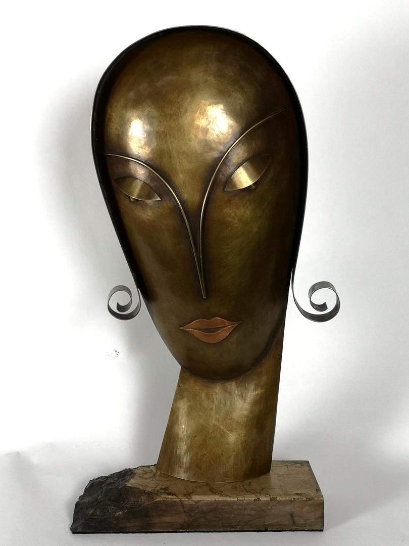 This elegant copper/bronze sculpture was inspired by Tamara de Lempickas Art Deco work. The very high quality metalwork of patinated, different metals was made by the hungarian Laszlo Pal Horvath goldsmith, from the late 20th century. It sits on a