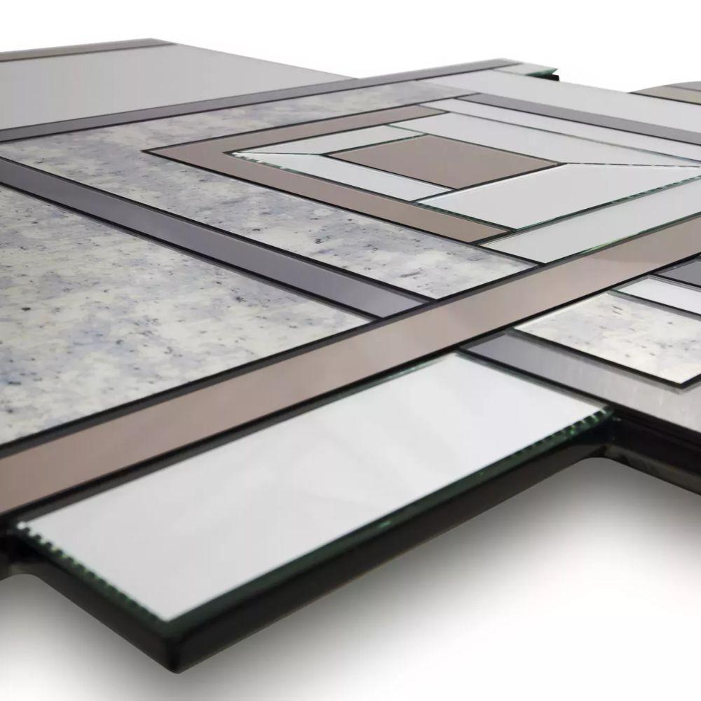 The Lemprica mirror brings together the whirlwind decade of the 1920's with rich angular shapes and multi-colored glass from the Art Deco period.

Materials 
Finishes:
Back: Iridescent Caramel (High Gloss Finish)
Front: Clear Mirror , Bronze