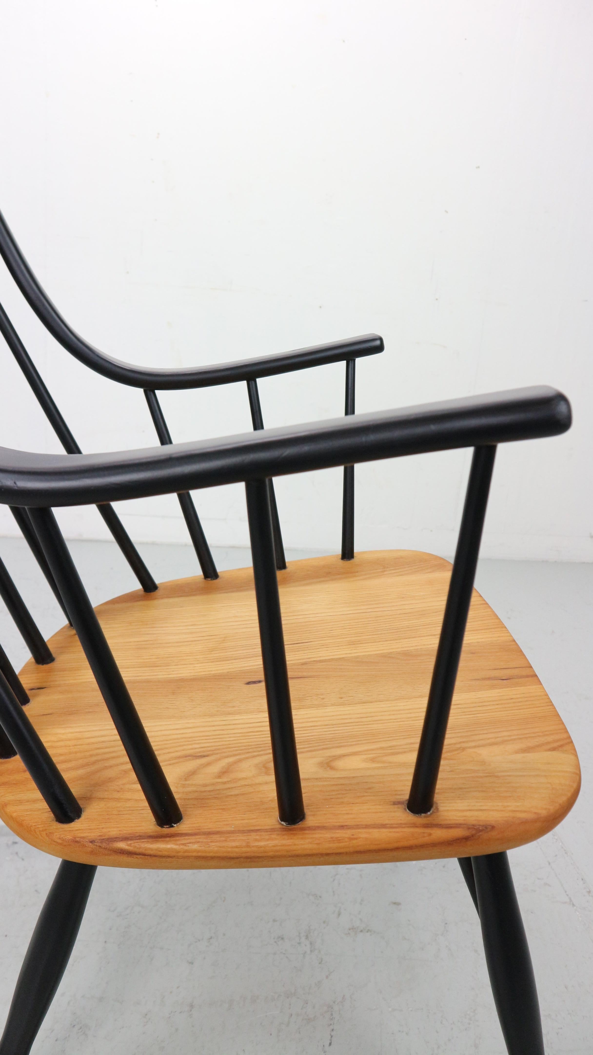 Lena Larsson, made by Nesto, a mid century rockingchair with sculptural arms 2