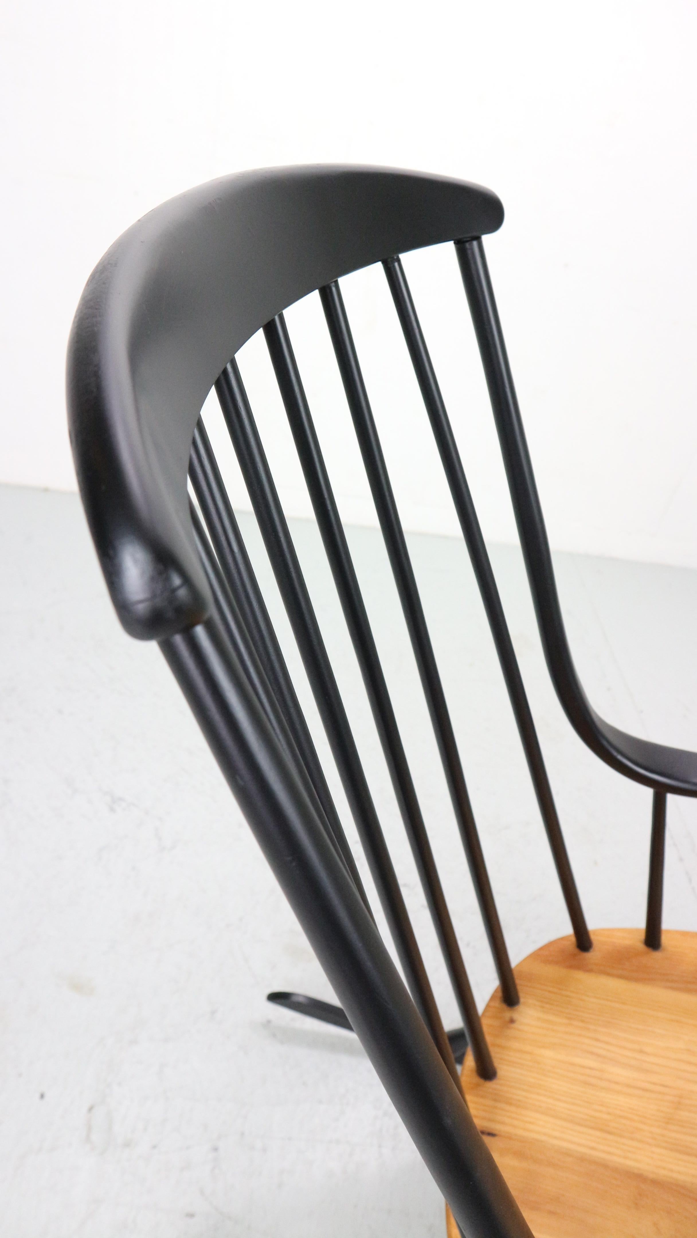 Lena Larsson, made by Nesto, a mid century rockingchair with sculptural arms 7