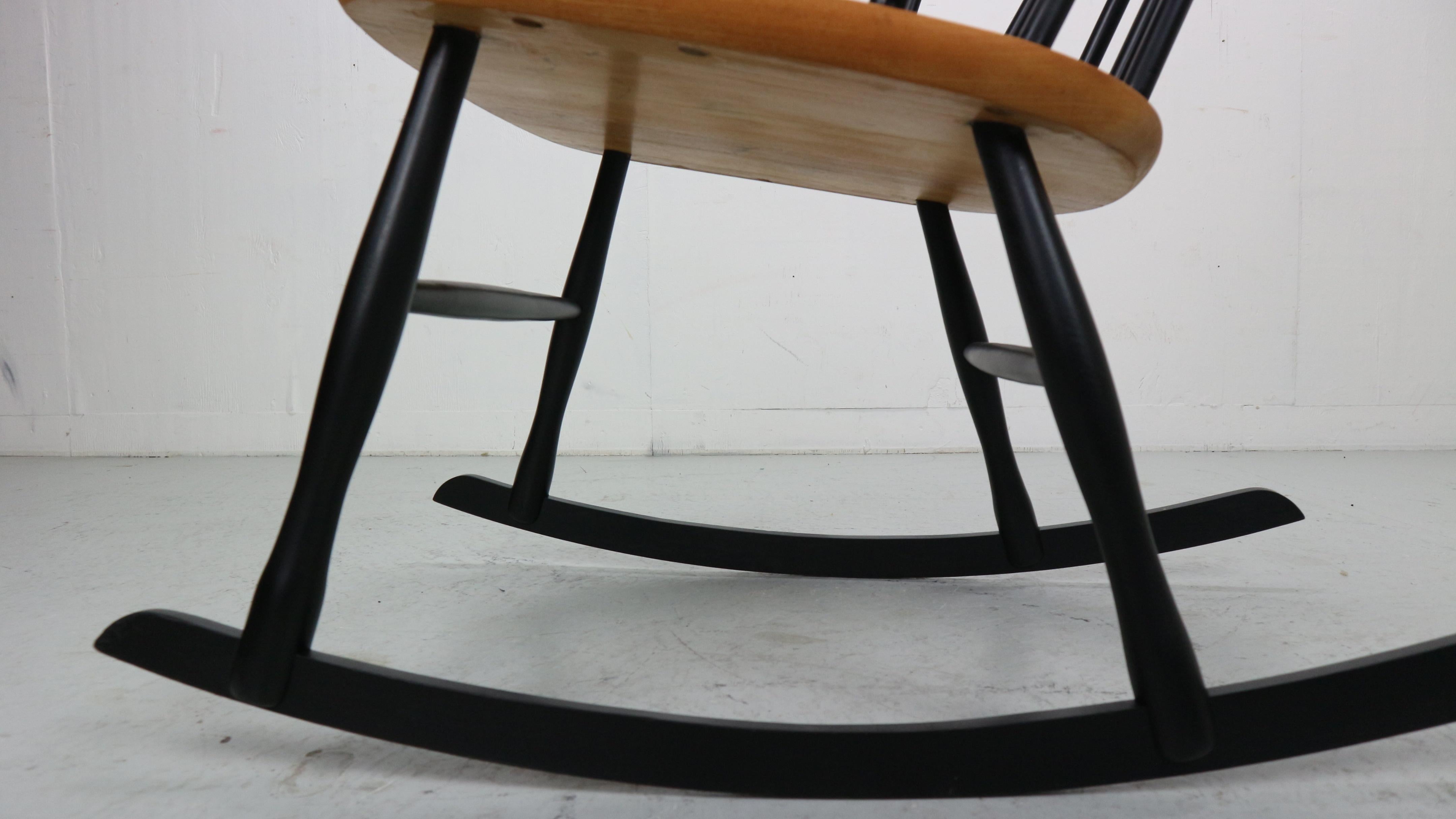 Lena Larsson, made by Nesto, a mid century rockingchair with sculptural arms 11