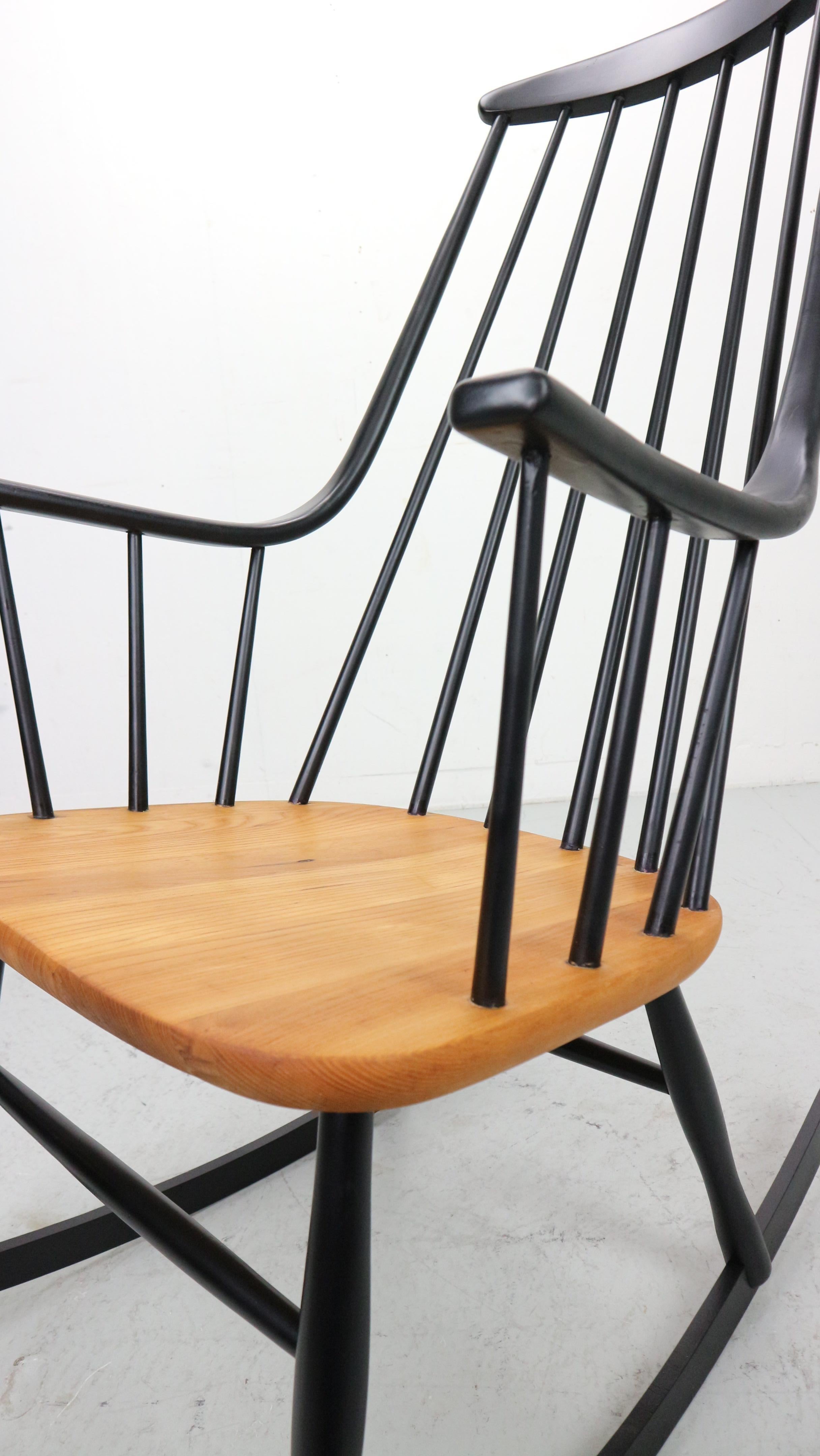 Lena Larsson, made by Nesto, a mid century rockingchair with sculptural arms 12