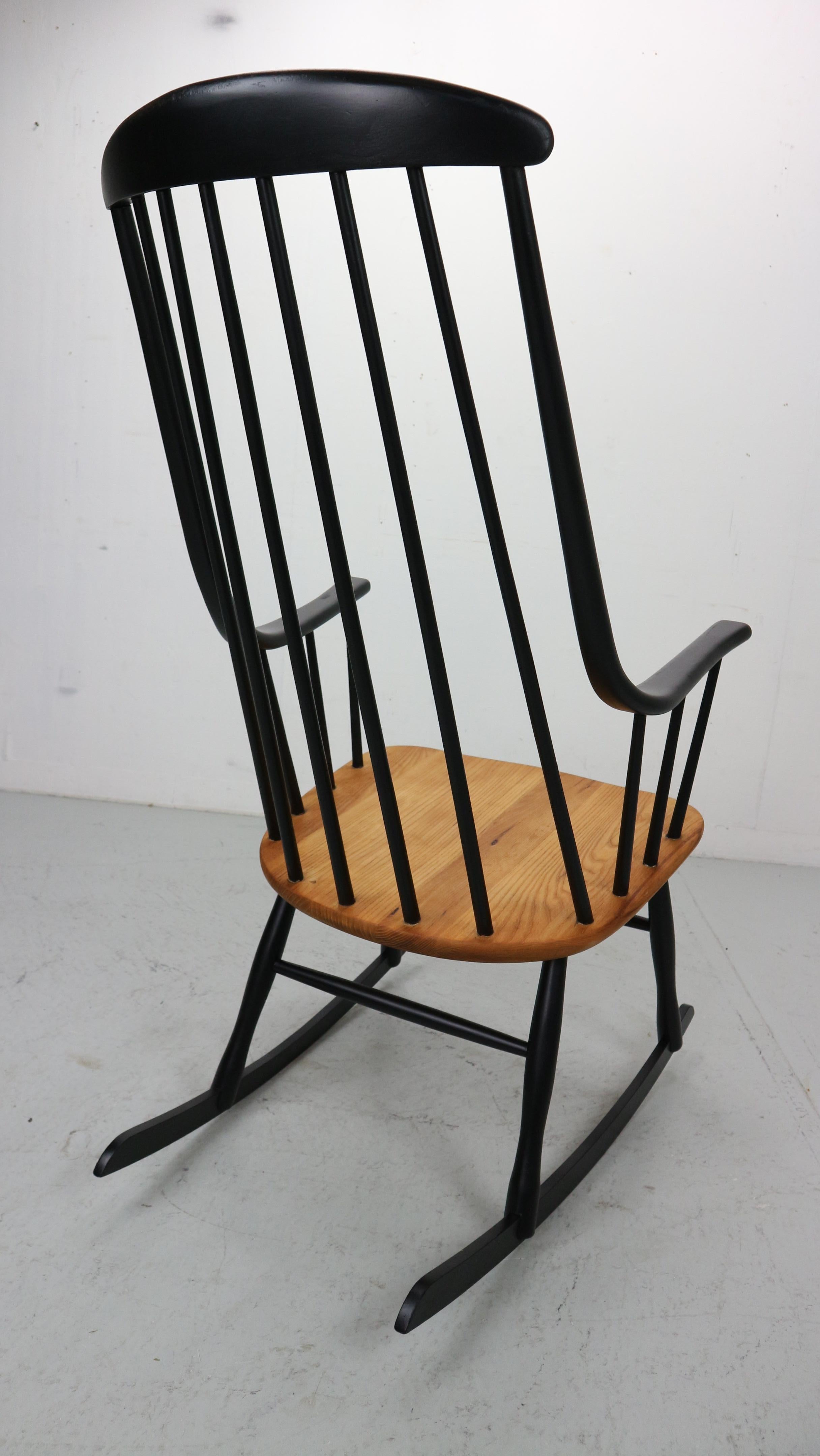 20th Century Lena Larsson, made by Nesto, a mid century rockingchair with sculptural arms
