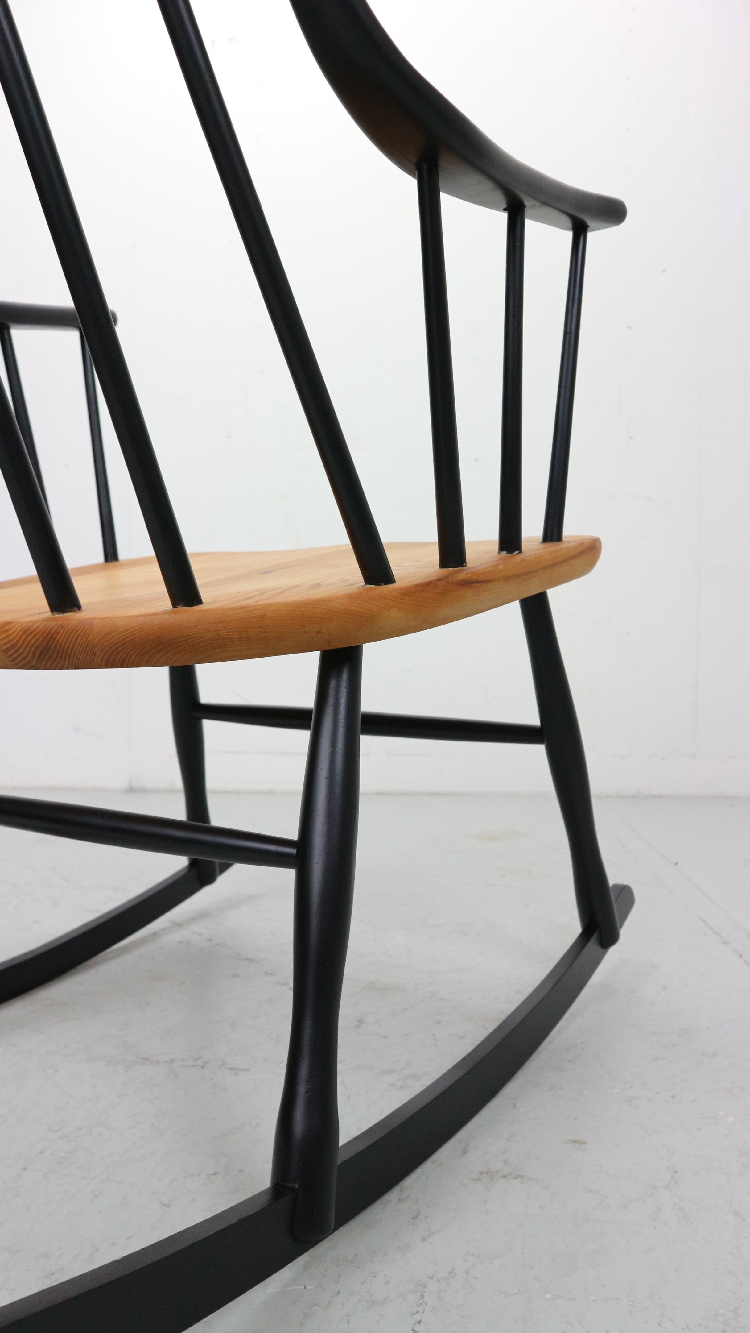 Lena Larsson, made by Nesto, a mid century rockingchair with sculptural arms 1