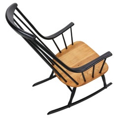 Vintage Lena Larsson, made by Nesto, a mid century rockingchair with sculptural arms