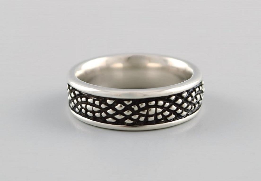 Lene Munthe for Georg Jensen. Ring in sterling silver. Model 426. Late 20th Century.
Width: 7 mm.
Diameter: 19 mm.
US size: 9.
In excellent condition.
Stamped.
In most cases, we can change the size for a fee (50 USD) per ring.