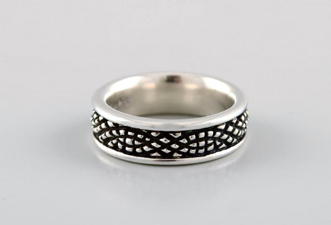 Lene Munthe for Georg Jensen. Ring in sterling silver. Model 426. 
Late 20th Century.
Width: 7 mm.
Diameter: 18 mm.
US size: 7.75.
In excellent condition.
Stamped.
In most cases, we can change the size for a fee (50 USD) per ring.
