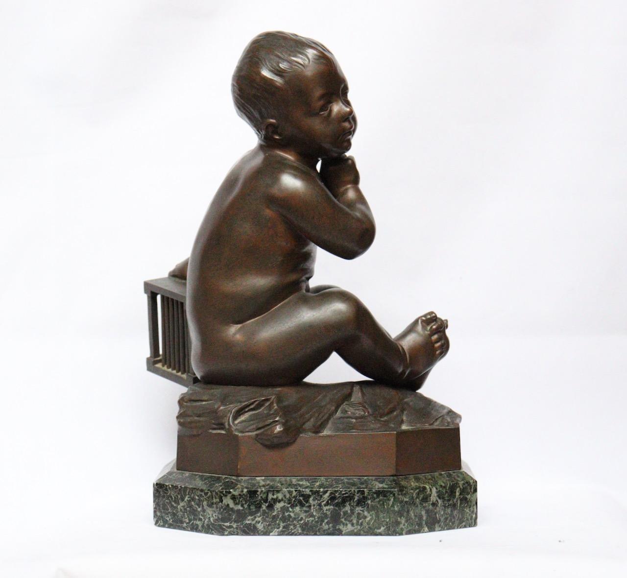Français « L'Enfant la Cage », une figurine en bronze du 19ème siècle d'après Jean-Baptiste Pigalle