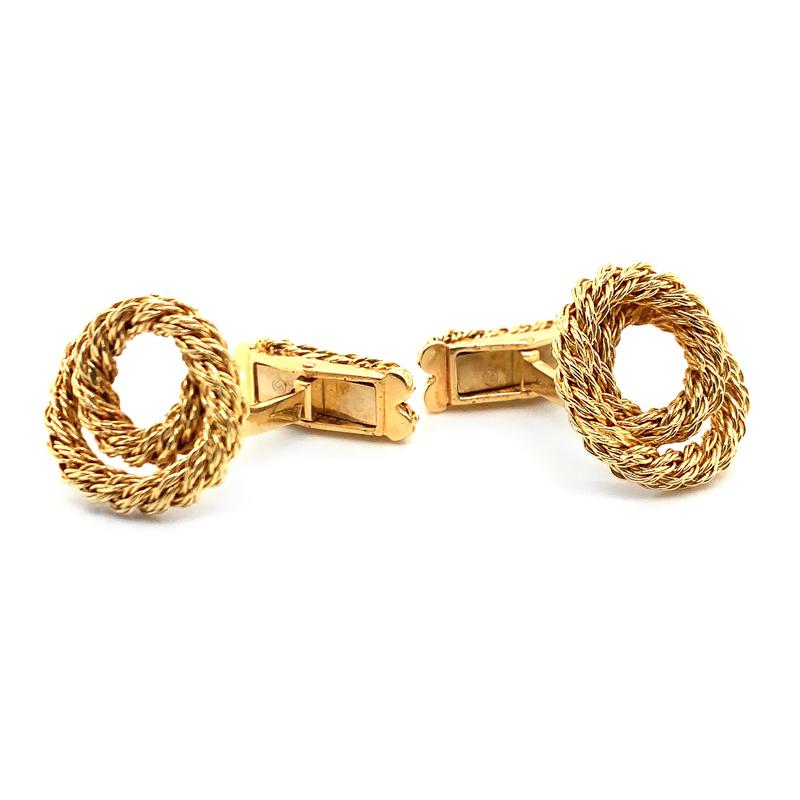 Handsome pair of nautical cufflinks.  Made and signed by Georges L'Enfant.  18K yellow gold.  Twisted rope motif. These cufflinks take us to Cannes or the French Riviera.  hey are a superb example of this pre-eminent jeweler's work.

Alice Kwartler