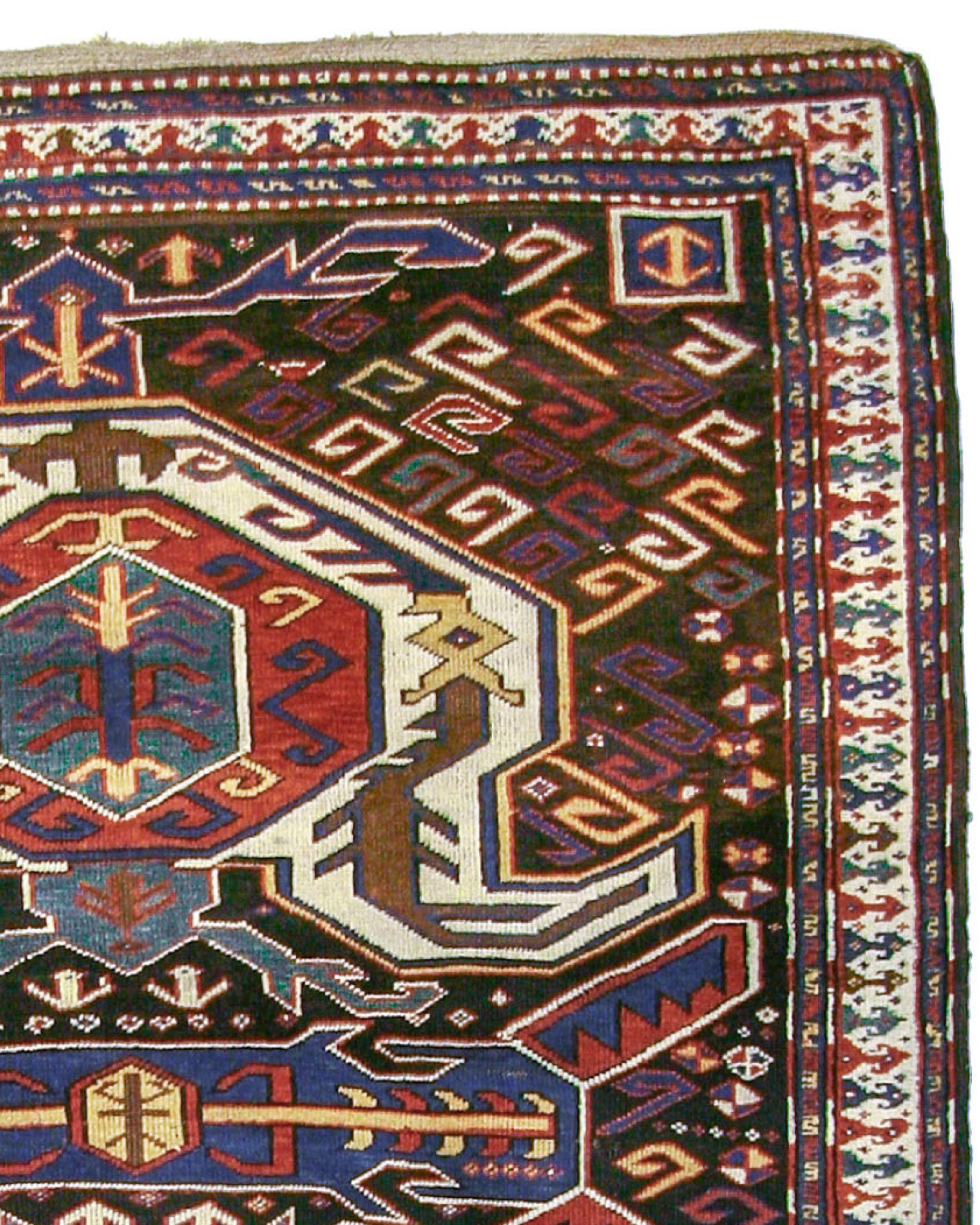 Antique Caucasian Lenkoran Rug, 19th Century

Great Caucasian rugs are renowned for their bold graphic quality and superb use of color. This Lenkoran piece exemplifies these standards. Distinctive white palmettes of the Lenkoran type here float
