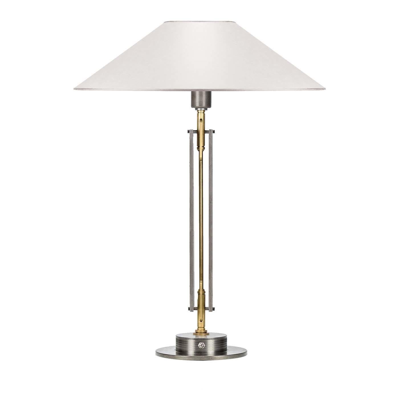 Imbued with timeless elegance, this table lamp will light up any corner at home with midcentury inspiration. Paired with both modern and traditional styles, this stylish piece showcases a sleek column with a brass rod encased in an open steel frame