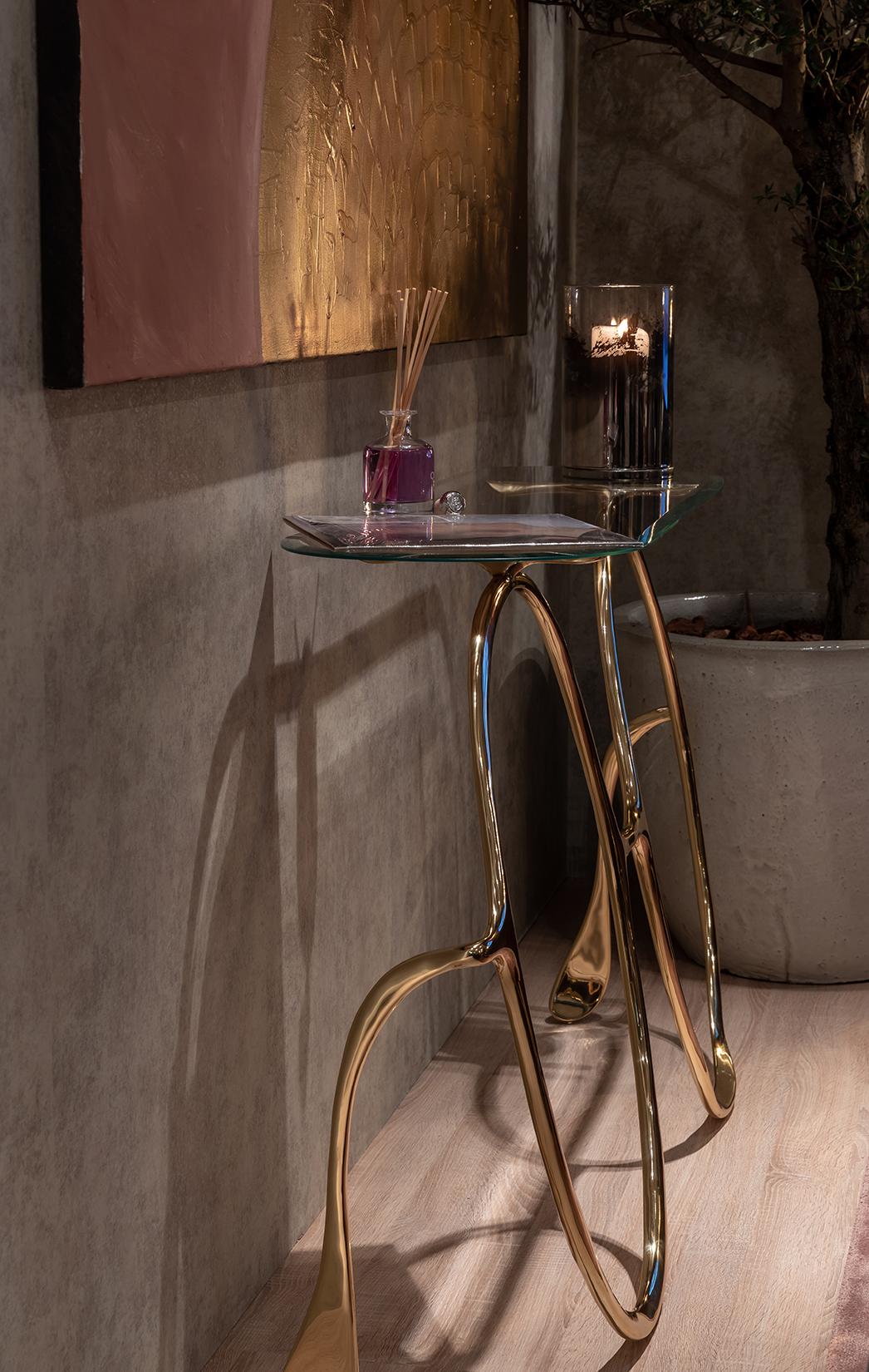glass and gold console table